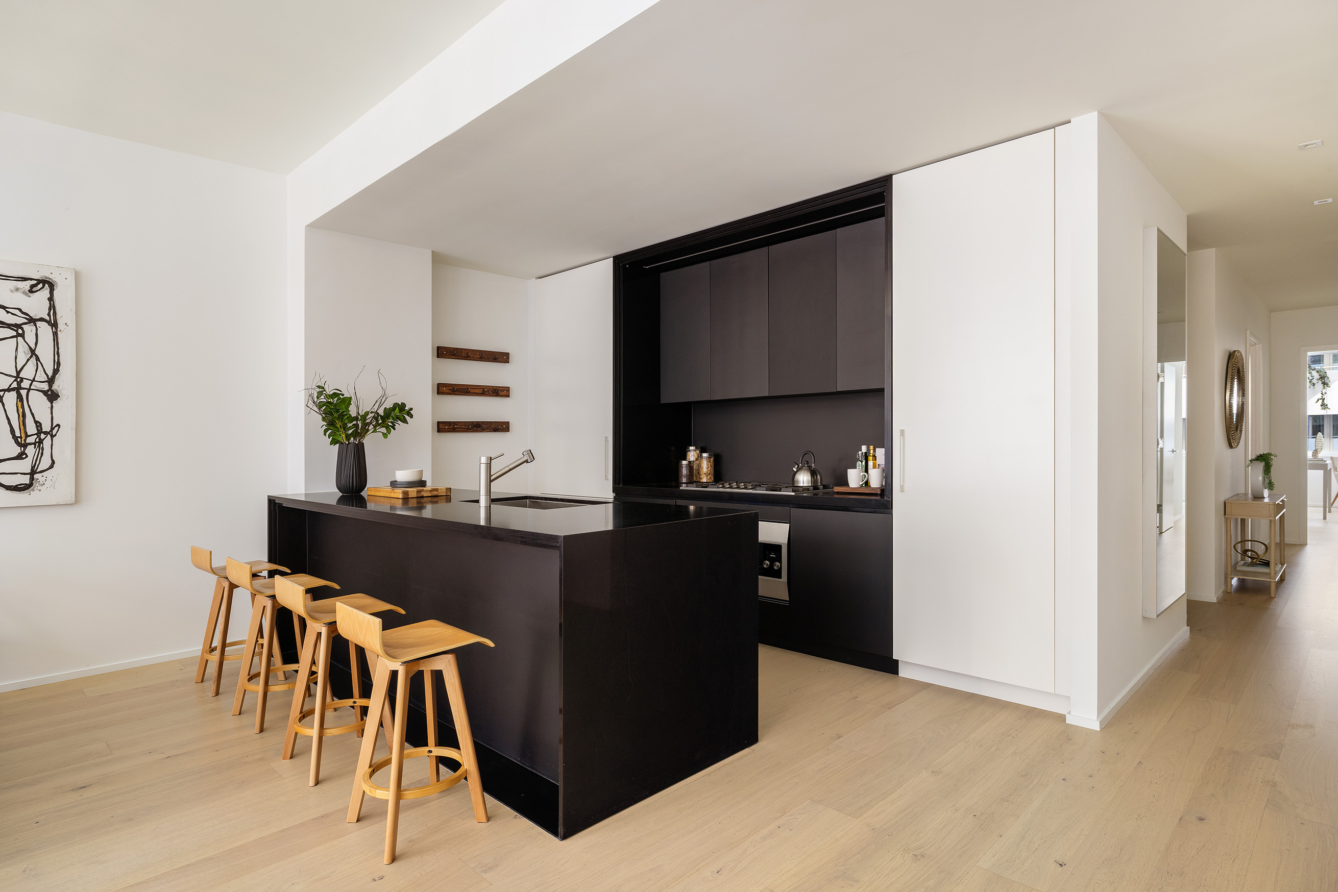 121 East 22nd Street, Unit S603 Manhattan, NY 10010 - Photo 4 of 12 a kitchen with a table and chairs in it