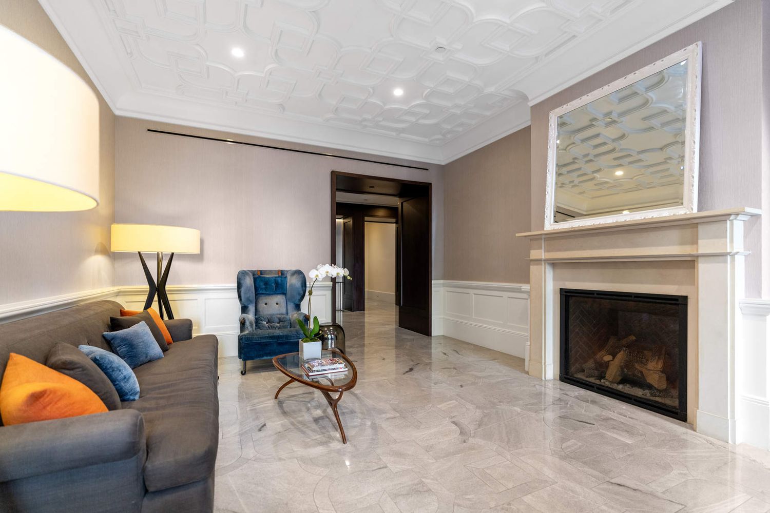 182 West 82nd Street, Unit 4E Manhattan, NY 10024 - Photo 22 of 25 a living room with furniture and a fireplace