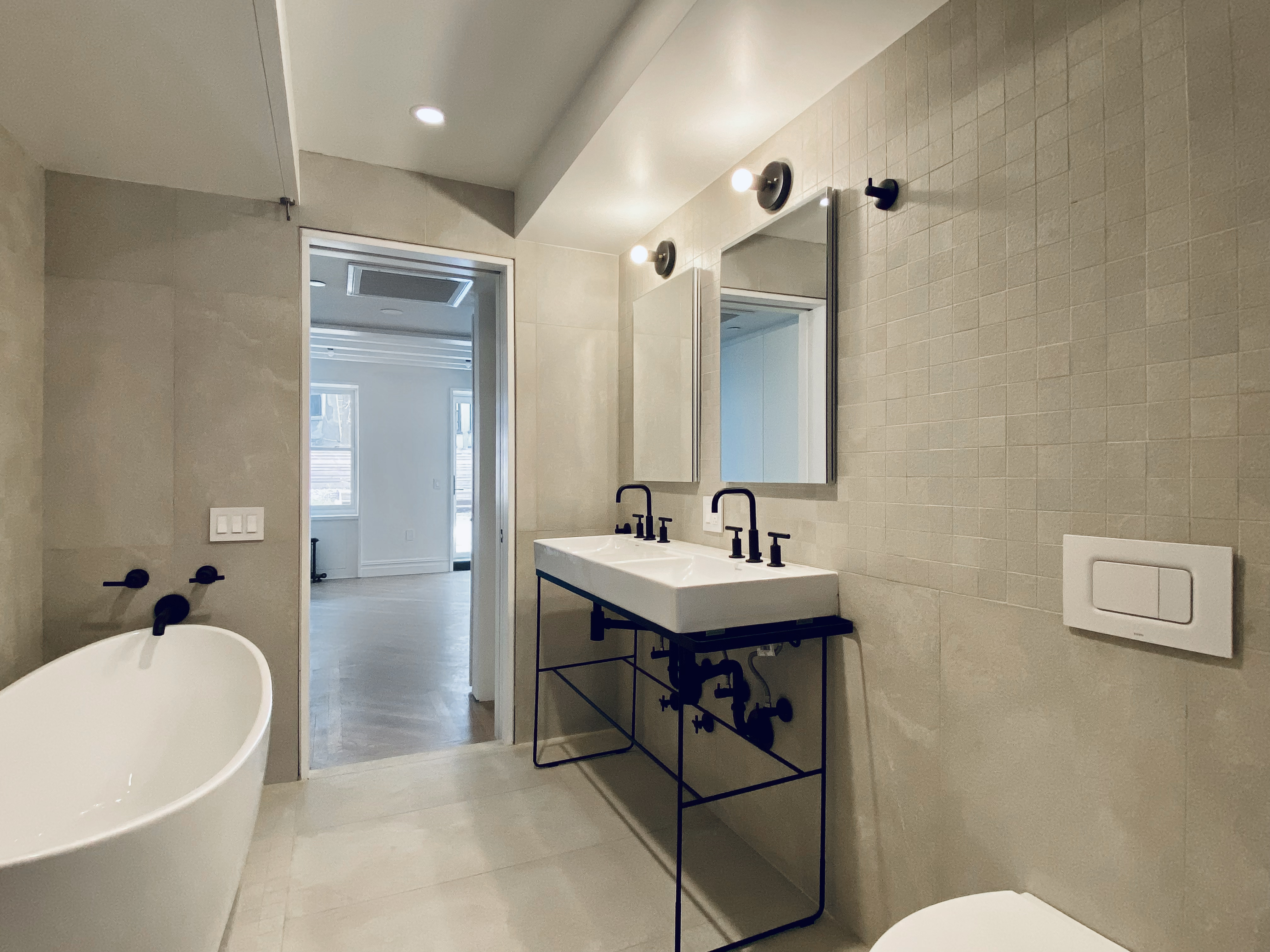 1420 Pacific Street, Unit 1 Brooklyn, NY 11216 - Photo 16 of 30 a bathroom with a sink a toilet and shower
