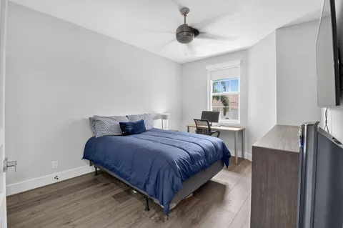 a view of swimming pool with seating area