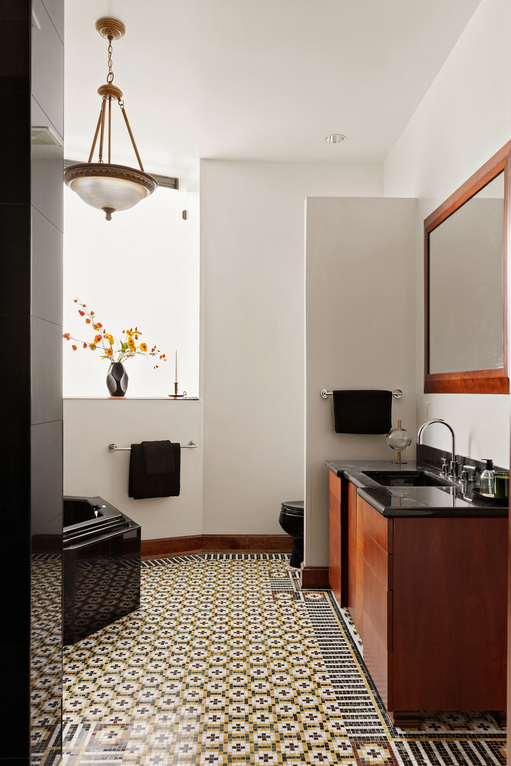 40 West 13th Street, Unit 2 Manhattan, NY 10011 - Photo 9 of 14 a room with gym equipment and a flat screen tv