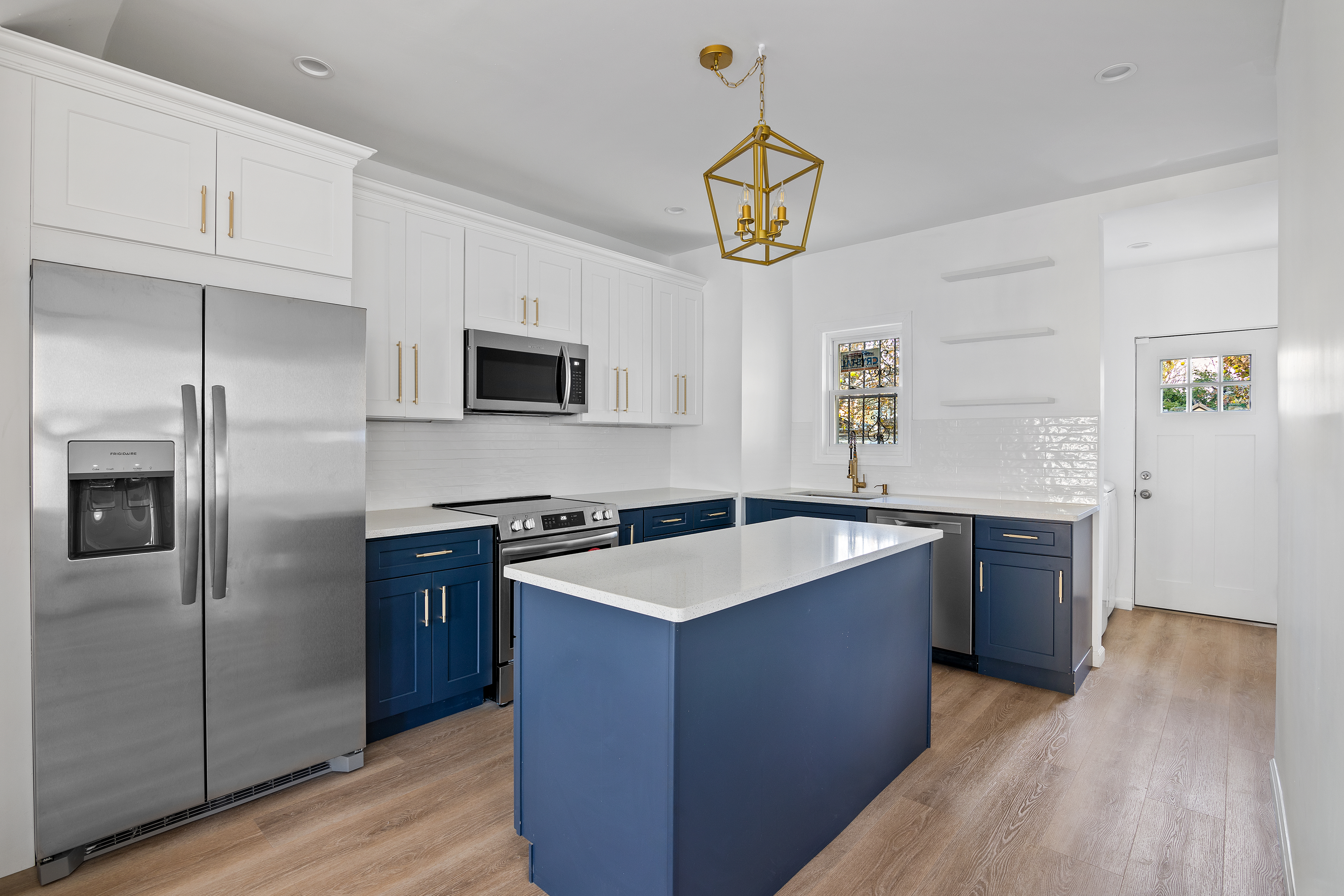 3810 Farragut Road, Unit 1 Brooklyn, NY 11210 - Photo 4 of 13 a kitchen with a sink stove and refrigerator