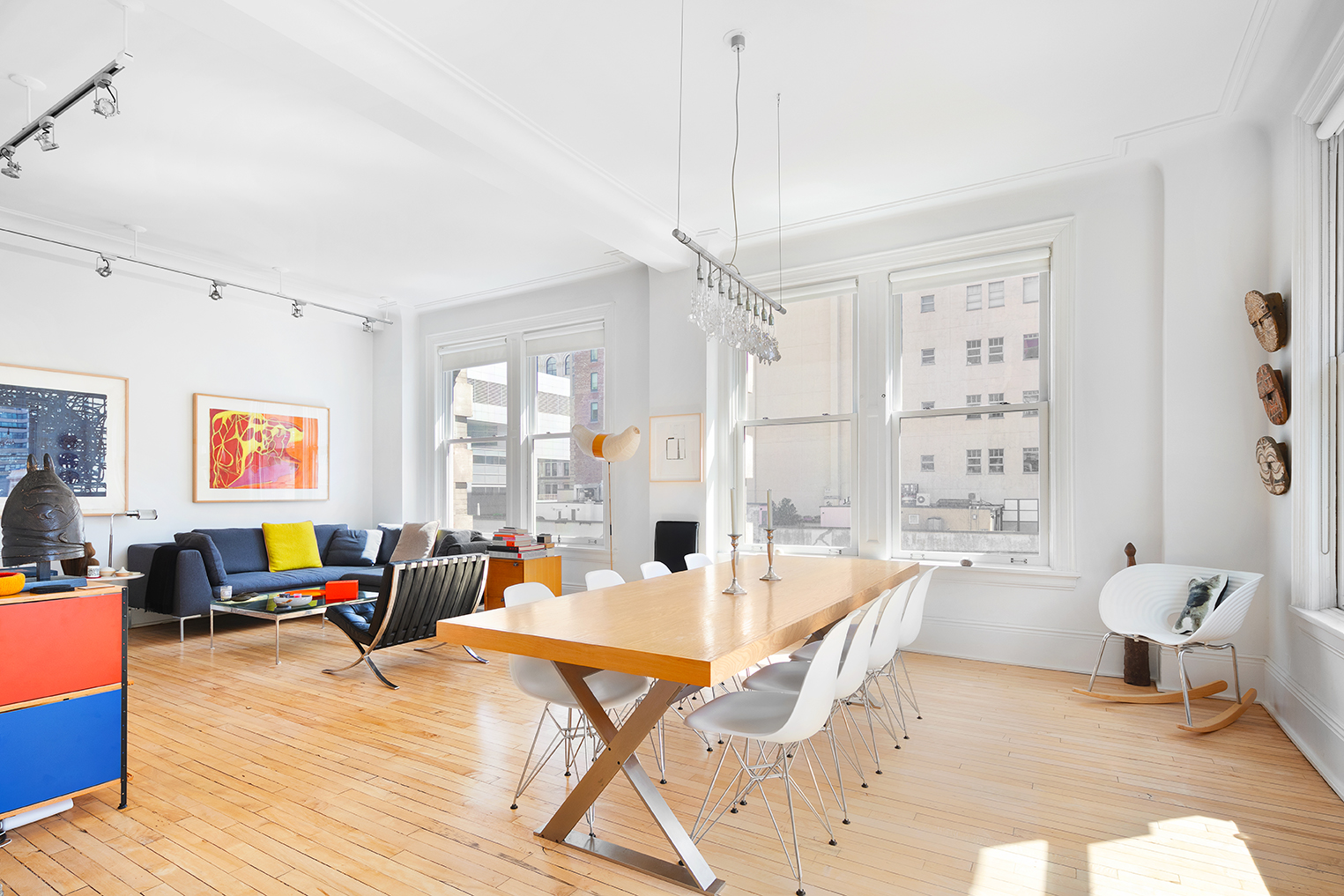 366 Broadway, Unit 8A Manhattan, NY 10013 - Photo 2 of 13 a living room with fireplace furniture and a large window