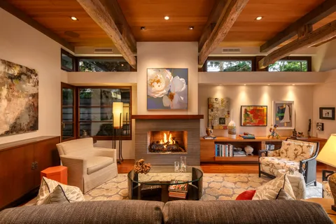 a large kitchen with stainless steel appliances a large window