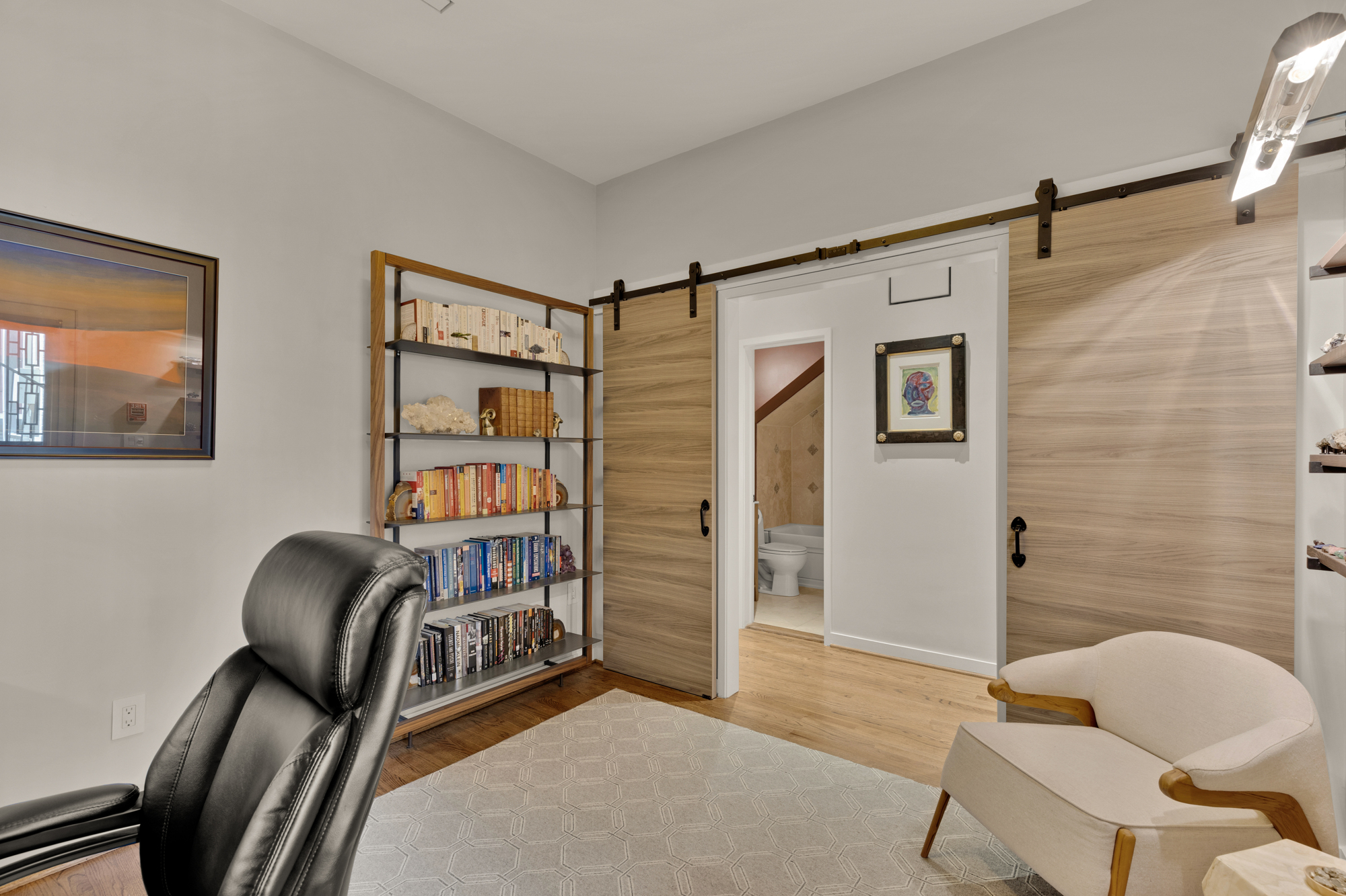 1407 15th Street Northwest, Unit 2 Washington, DC 20005 - Photo 18 of 24 a view of a livingroom with workspace and a couch