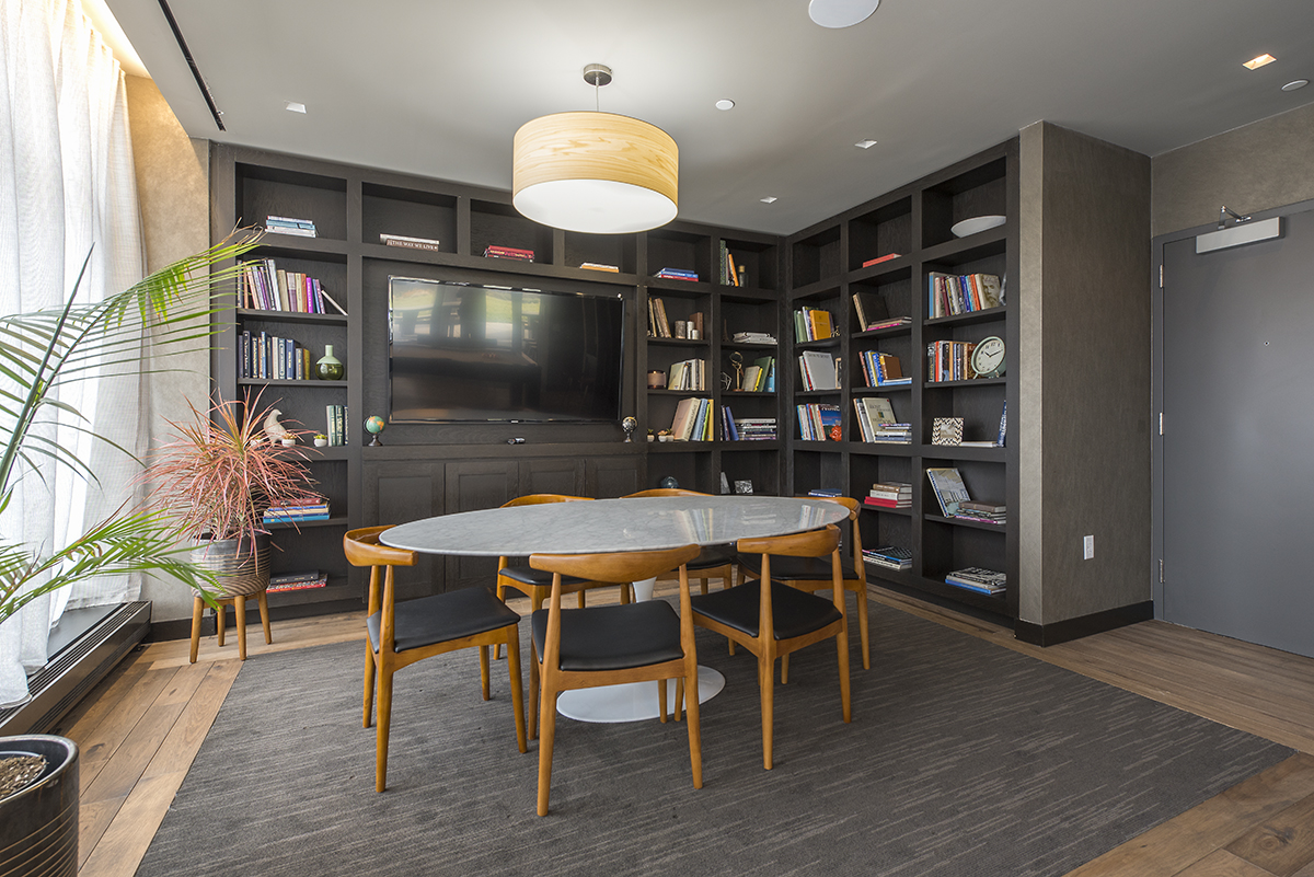 282 South 5th Street, Unit 7F Brooklyn, NY 11211 - Photo 11 of 16 a dining room with a wooden table and chairs