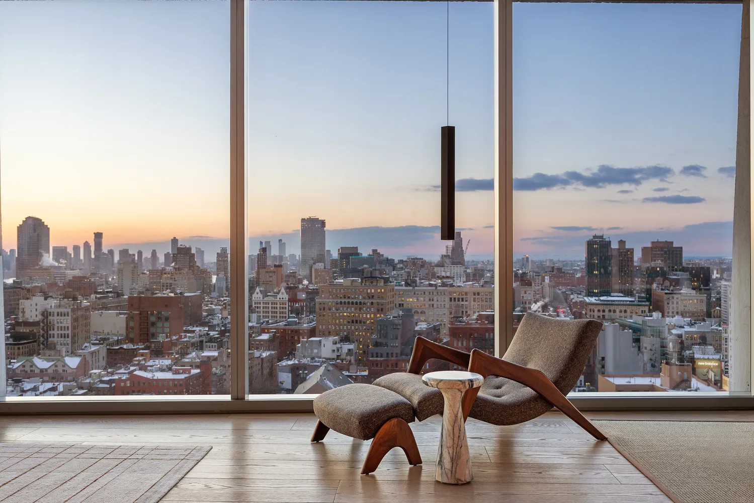 a view of a balcony with furniture