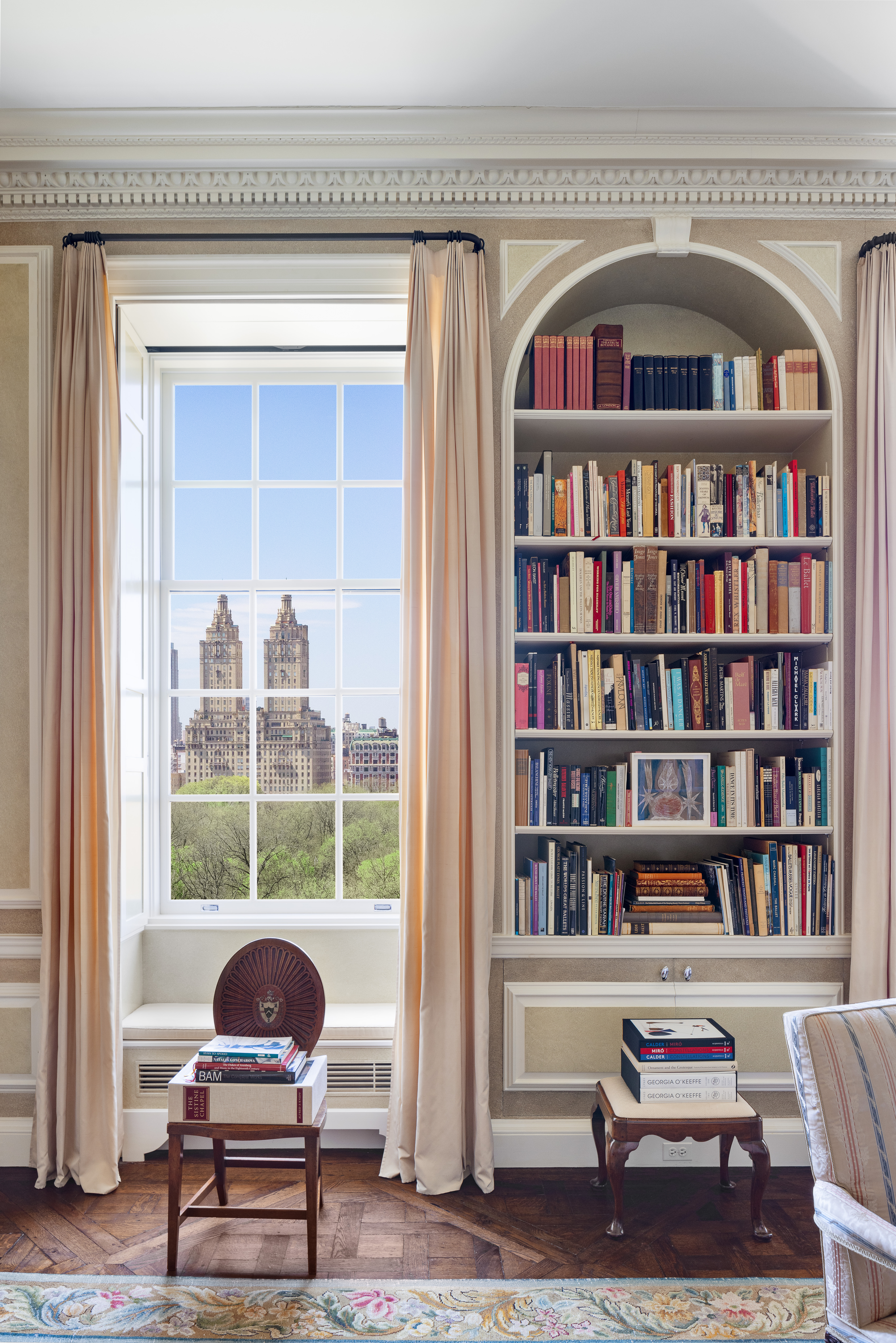 960 5th Avenue Manhattan, NY 10075 - Photo 9 of 13 a living room with bookshelf and a book shelf