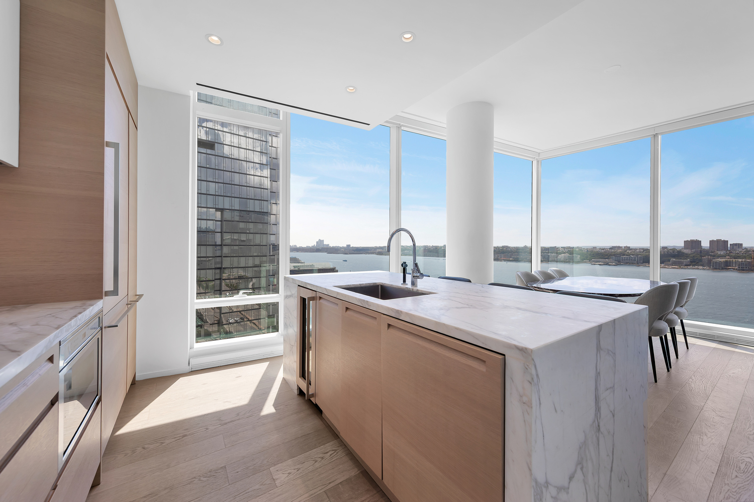 30 Riverside Boulevard, Unit 22A Manhattan, NY 10069 - Photo 2 of 29 a kitchen with a stove a sink and a refrigerator