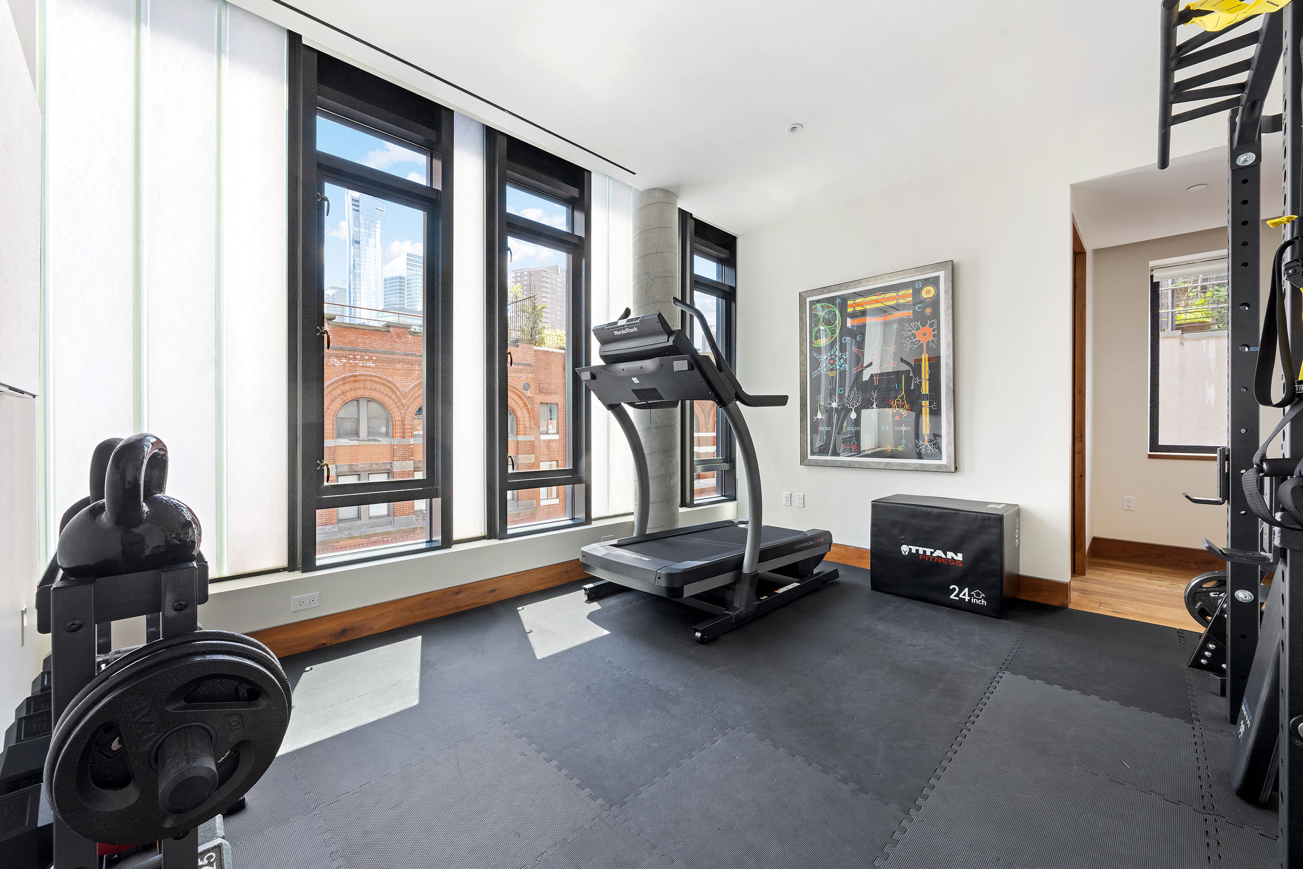 15 Leonard Street, Unit PH Manhattan, NY 10013 - Photo 29 of 37 a living room with furniture and a flat screen tv
