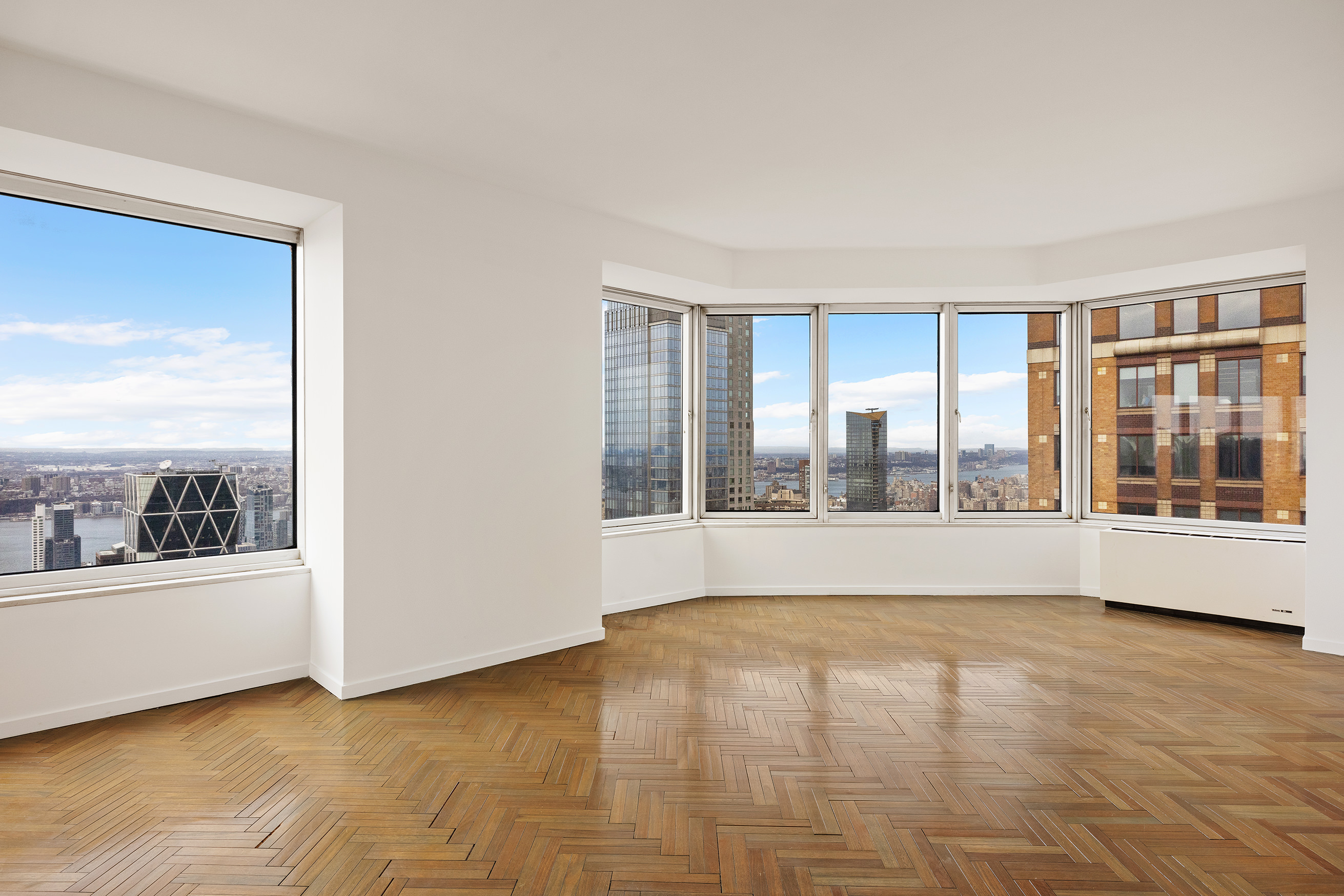 150 West 56th Street, Unit 6204 Manhattan, NY 10019 - Photo 6 of 15 a view of an empty room with a window