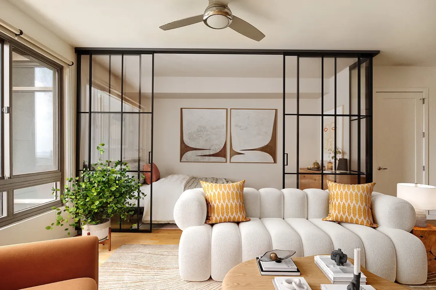 a living room with furniture and a large window