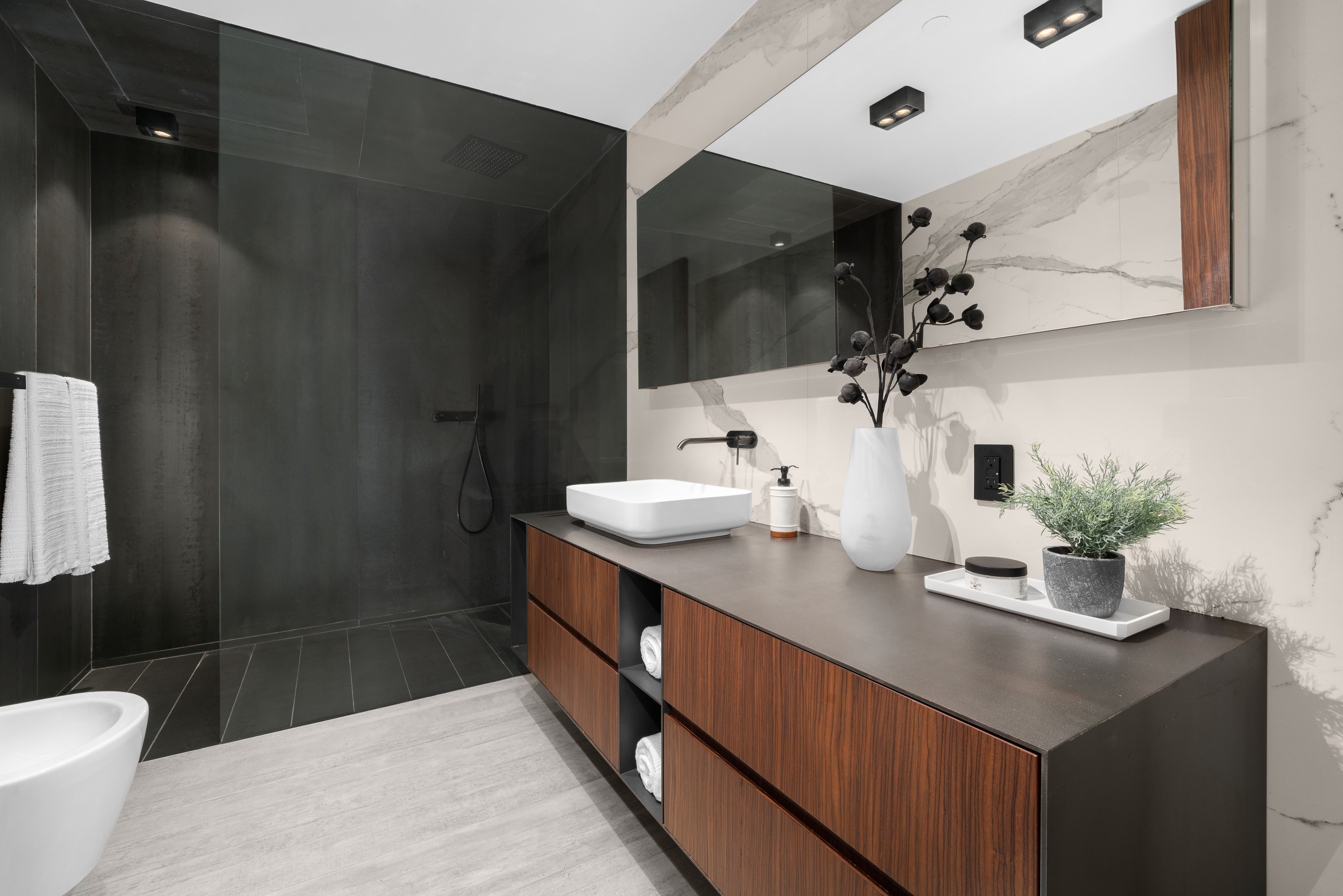 619 East 6th Street, Unit 4 Manhattan, NY 10009 - Photo 11 of 12 a bathroom with a sink a toilet and shower