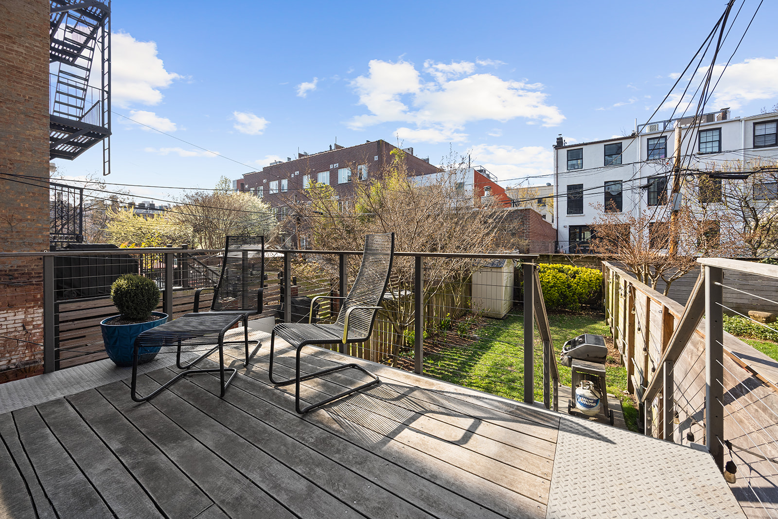 50 Wyckoff Street, Unit 2 Brooklyn, NY 11201 - Photo 2 of 14 a view of a balcony with chairs and wooden floor