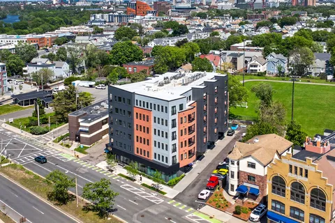 a view of a building with a street