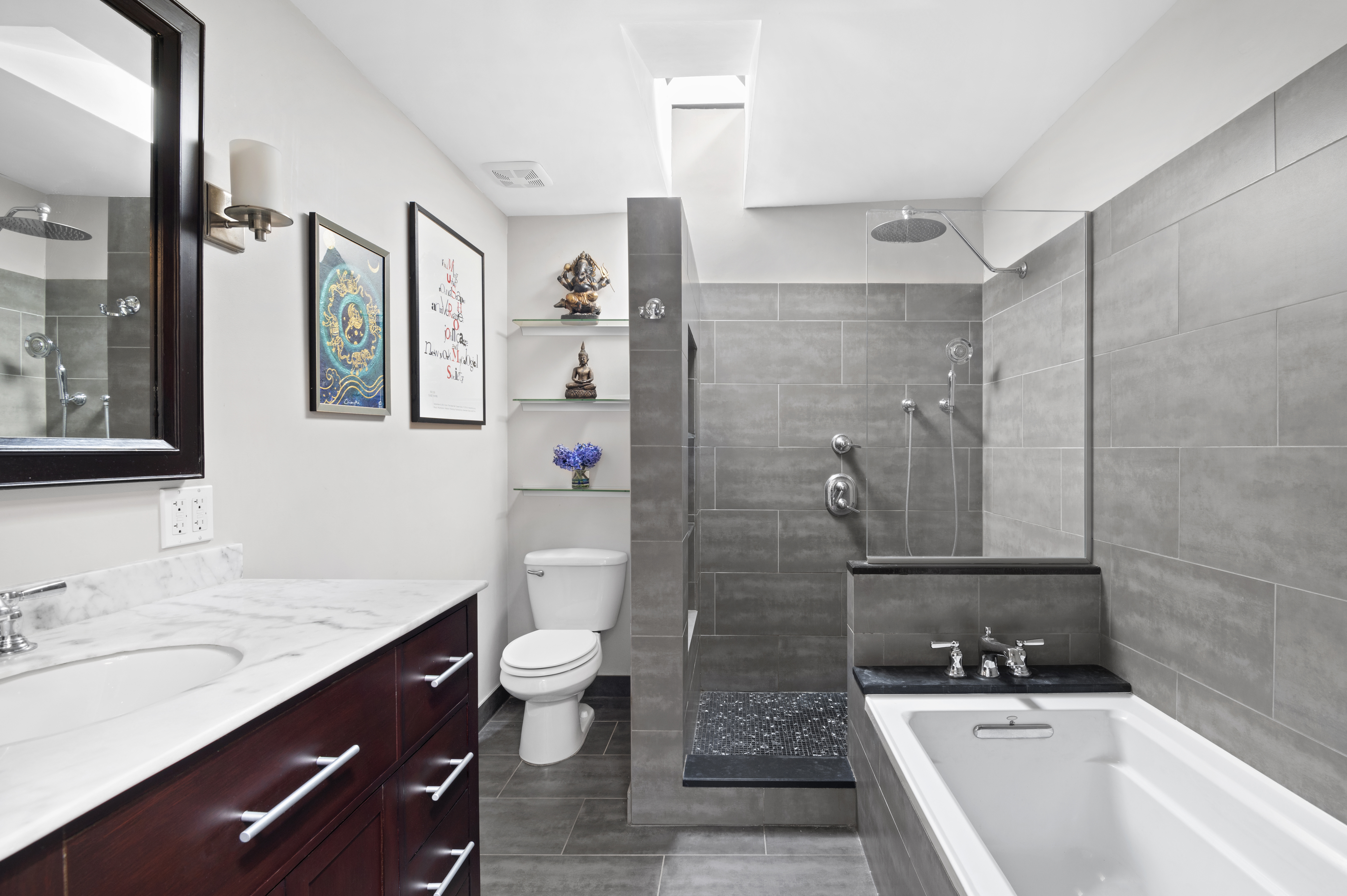 457 Warren Street Brooklyn, NY 11217 - Photo 9 of 16 a bathroom with a granite countertop sink toilet and shower