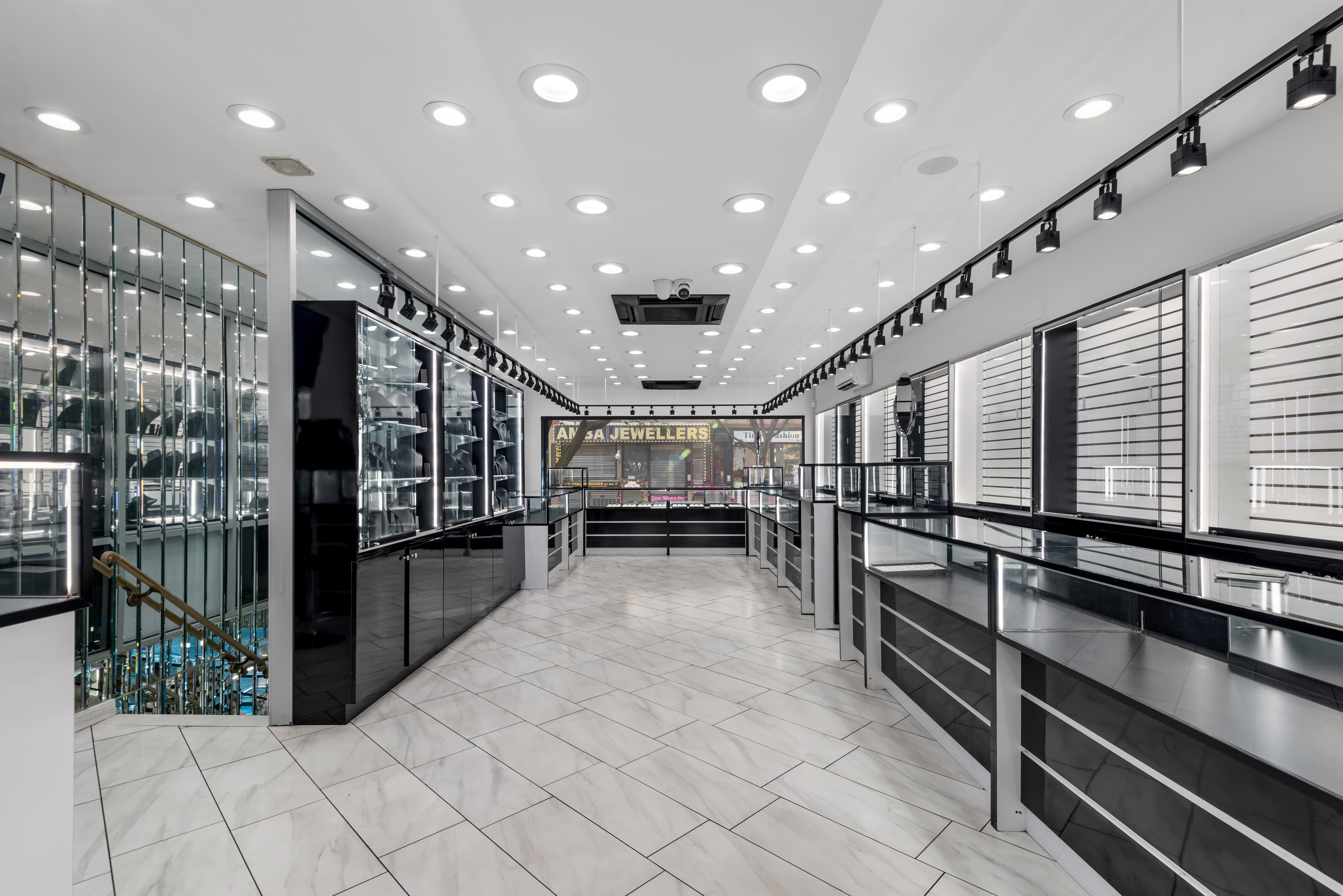 37-14 74th Street Queens, NY 11372 - Photo 2 of 8 a view of a hallway with wooden floor