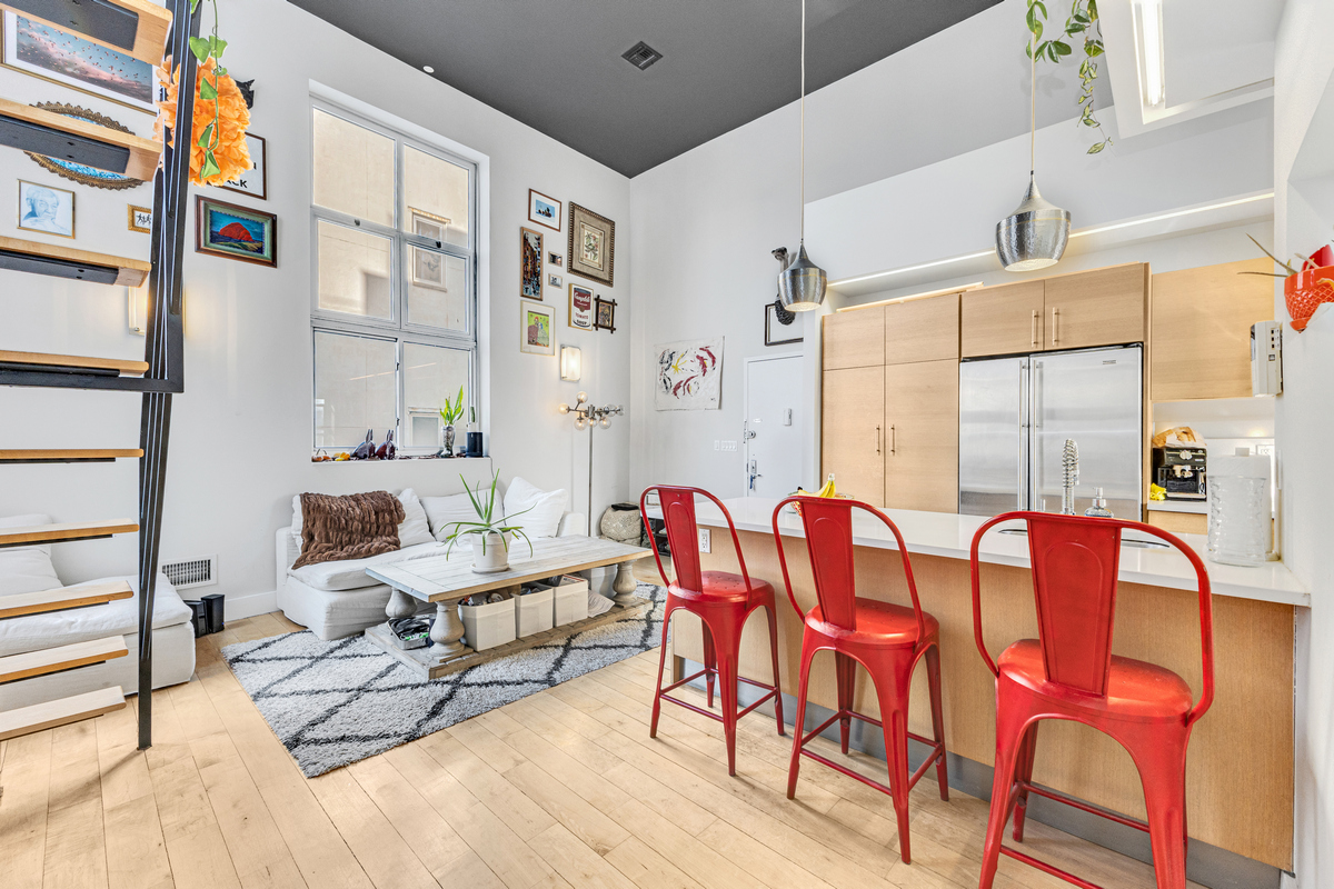 96 Woodpoint Road, Unit 3A Brooklyn, NY 11211 - Photo 5 of 15 a dining room with furniture and wooden floor