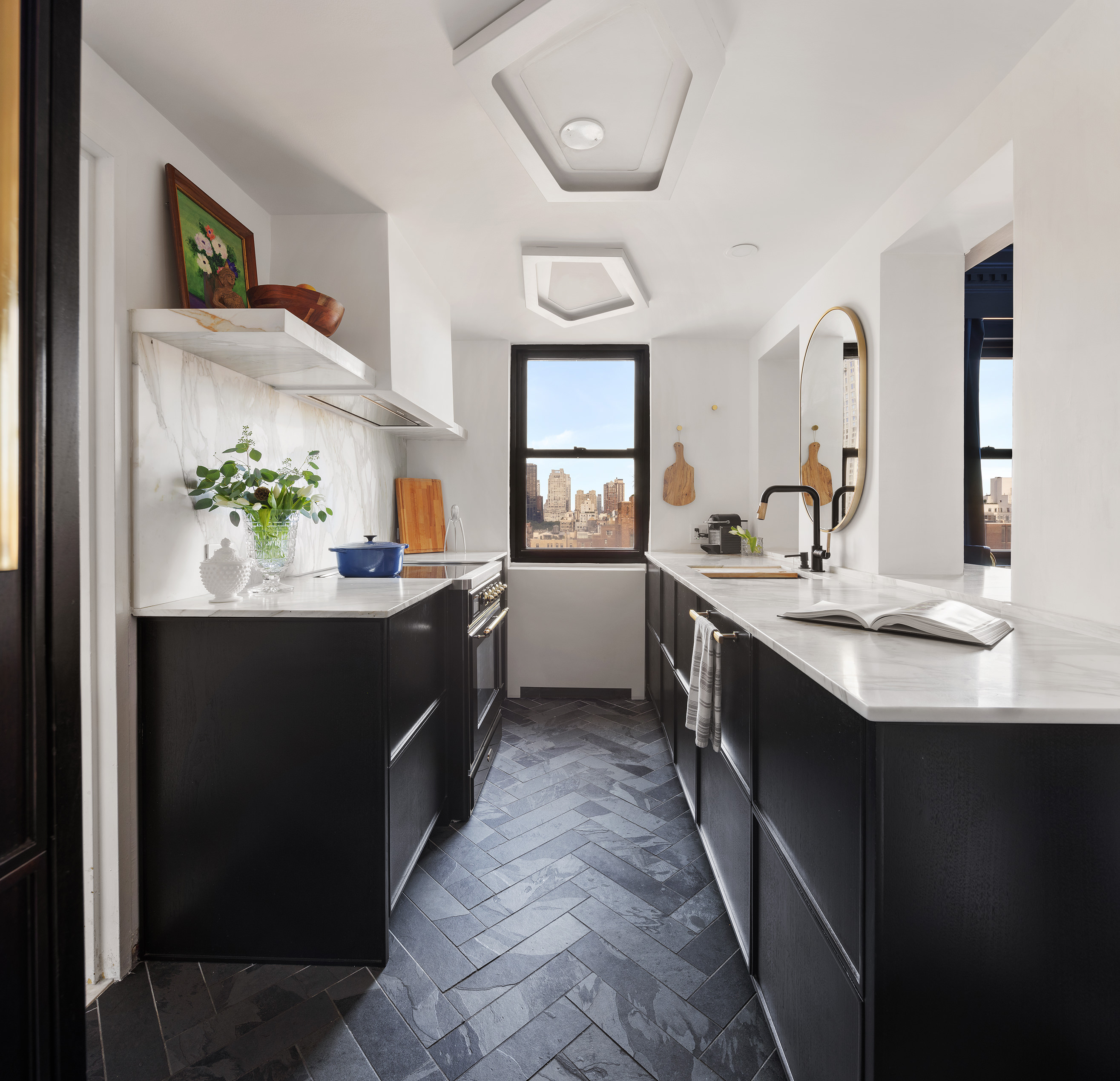 175 East 62nd Street, Unit PHA Manhattan, NY 10065 - Photo 6 of 18 a kitchen with a sink and stove top oven