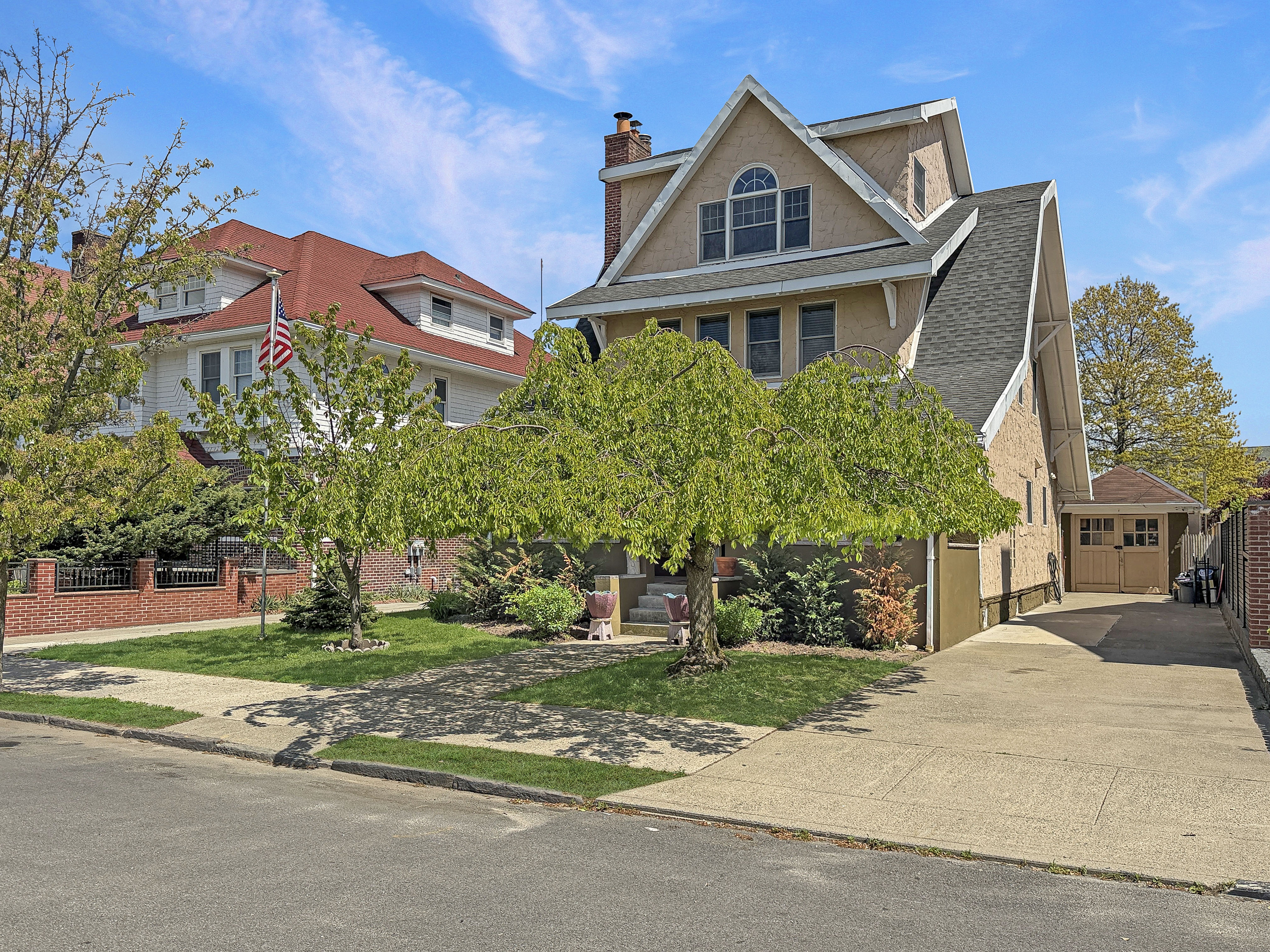 5007 Surf Avenue Brooklyn, NY 11224 - Photo 2 of 37 a front view of a house with a yard