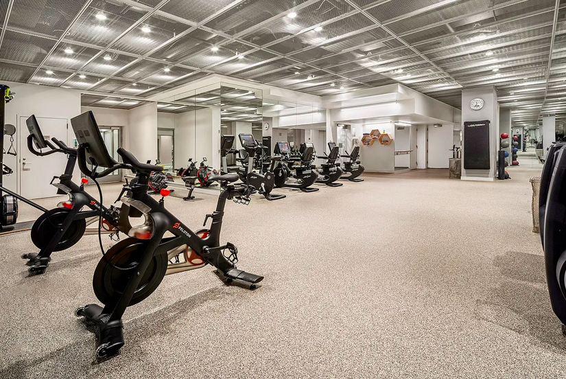 200 East 66th Street, Unit C704 Manhattan, NY 10065 - Photo 15 of 23 a view of a room with gym equipment