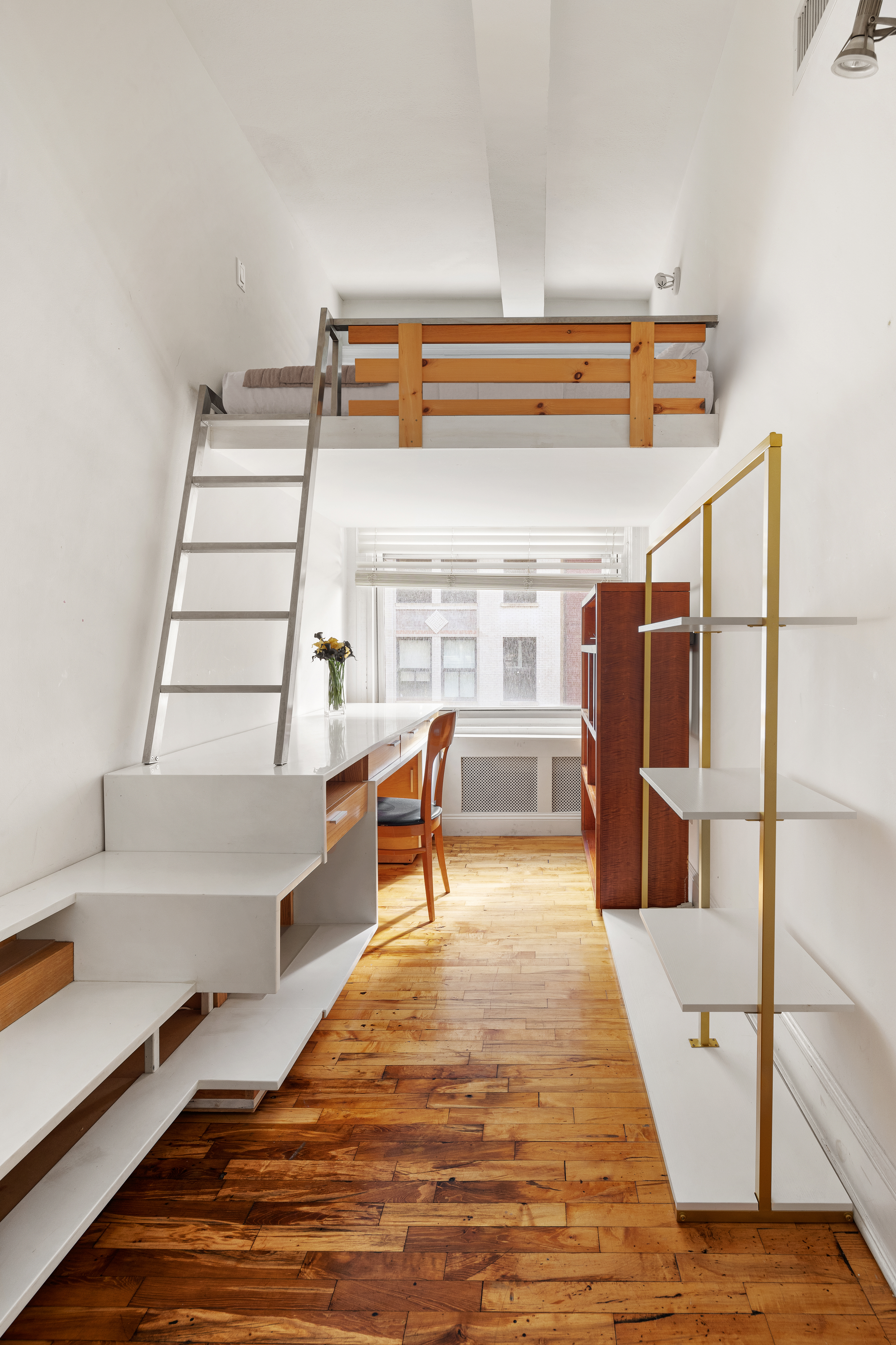 126 West 22nd Street, Unit 5N Manhattan, NY 10011 - Photo 11 of 13 a living room with furniture and a table