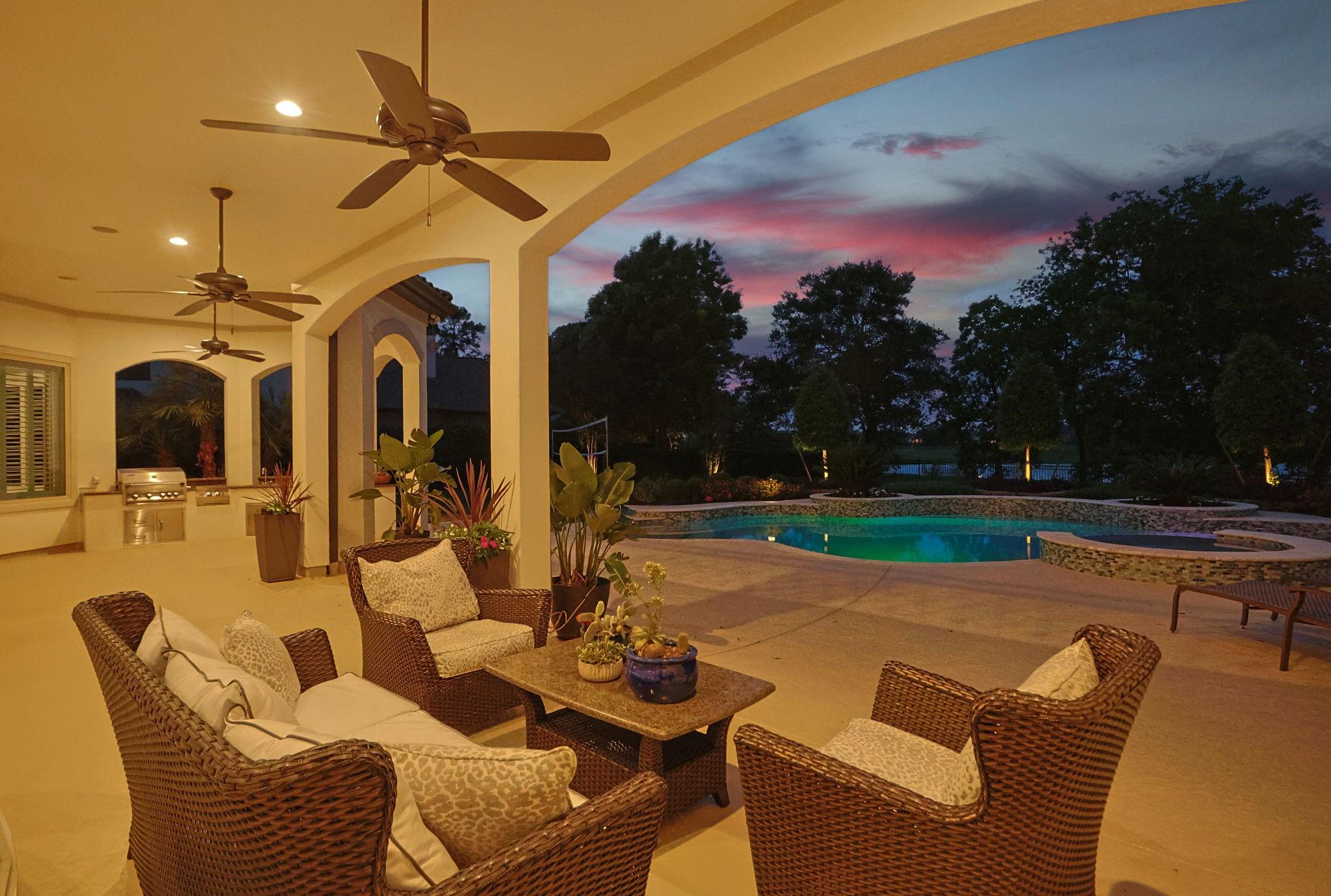 82 Manor Lake Estates Circle Spring, TX 77379 - Photo 49 of 52 a view of a patio with couches table and chairs