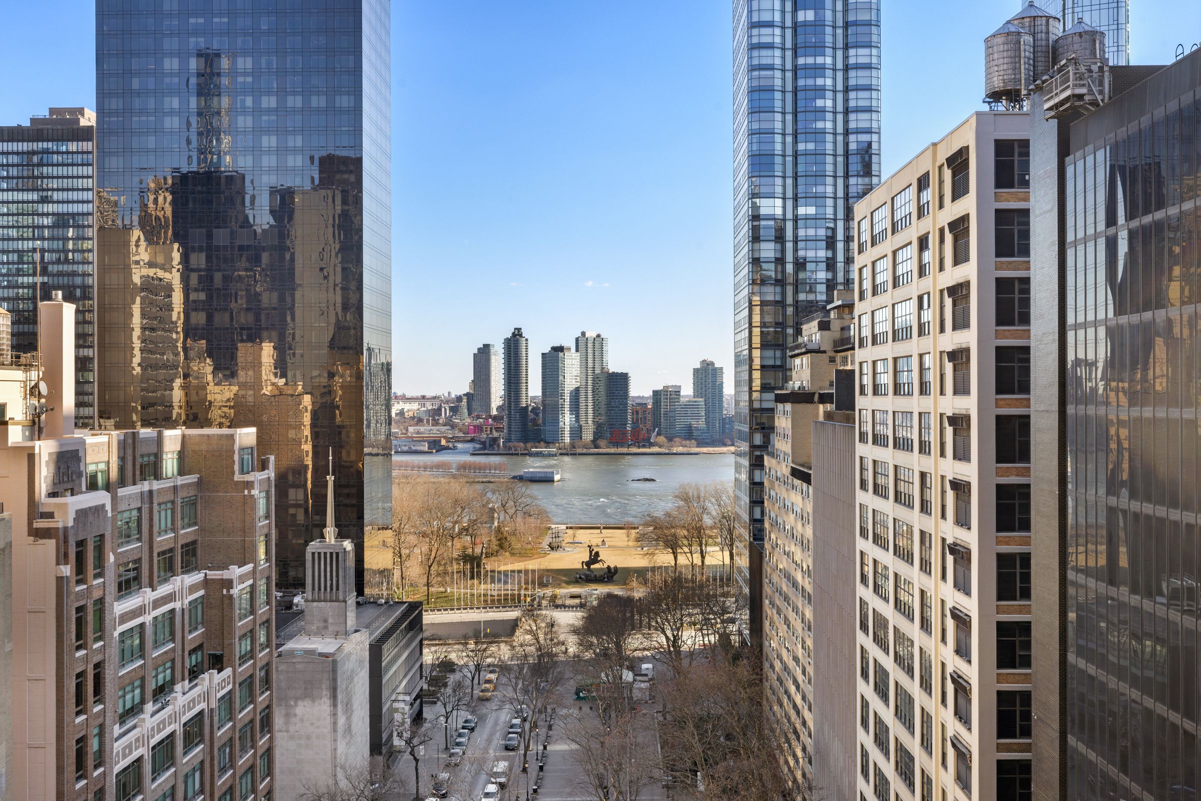 240 East 47th Street, Unit 16CD Manhattan, NY 10017 - Photo 2 of 14 a view of a city with tall buildings