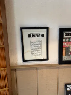 a view of water heater and wooden wall