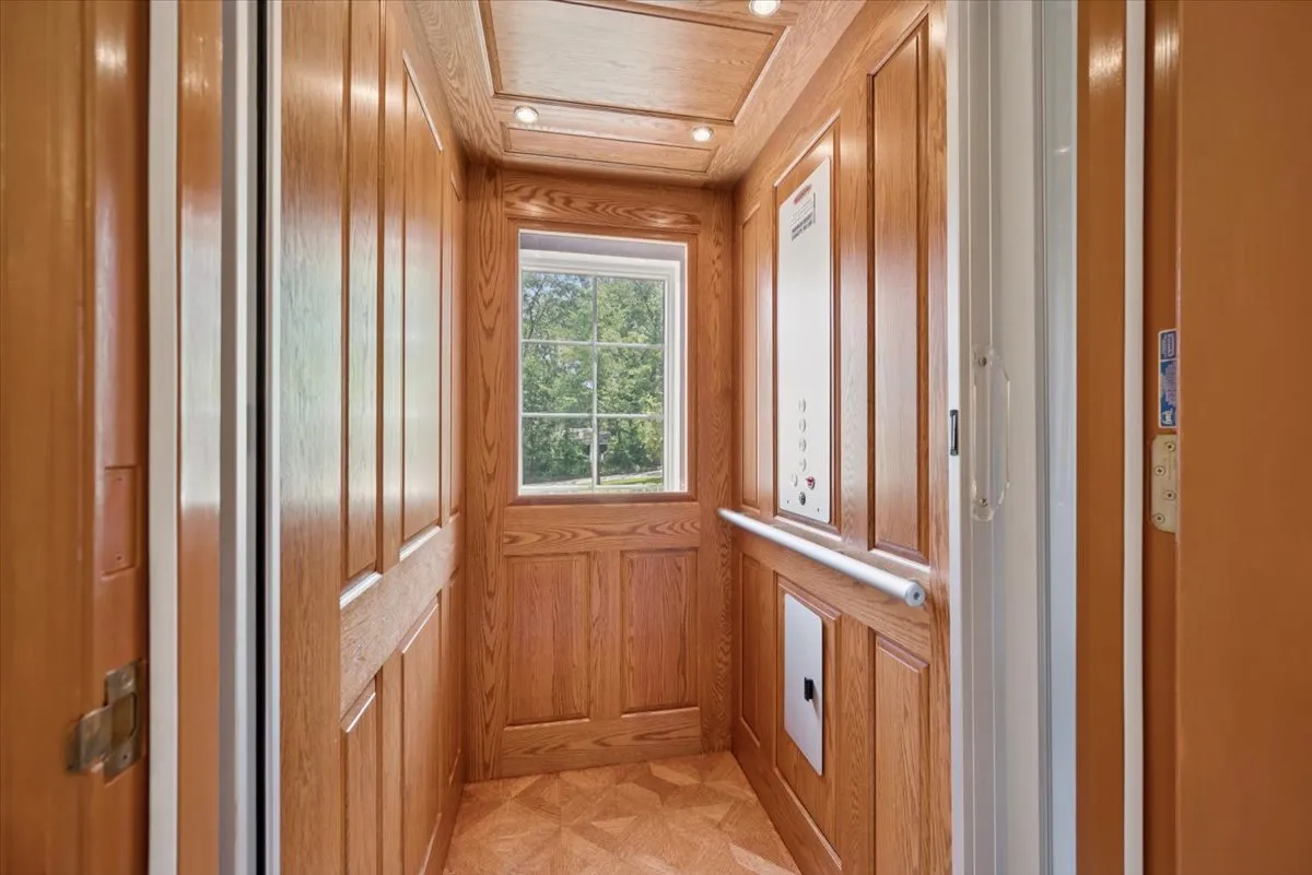 a kitchen with granite countertop a refrigerator stove top oven a sink and dishwasher