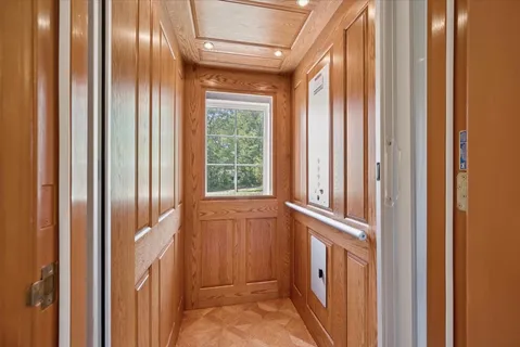 a kitchen with granite countertop a refrigerator stove top oven a sink and dishwasher