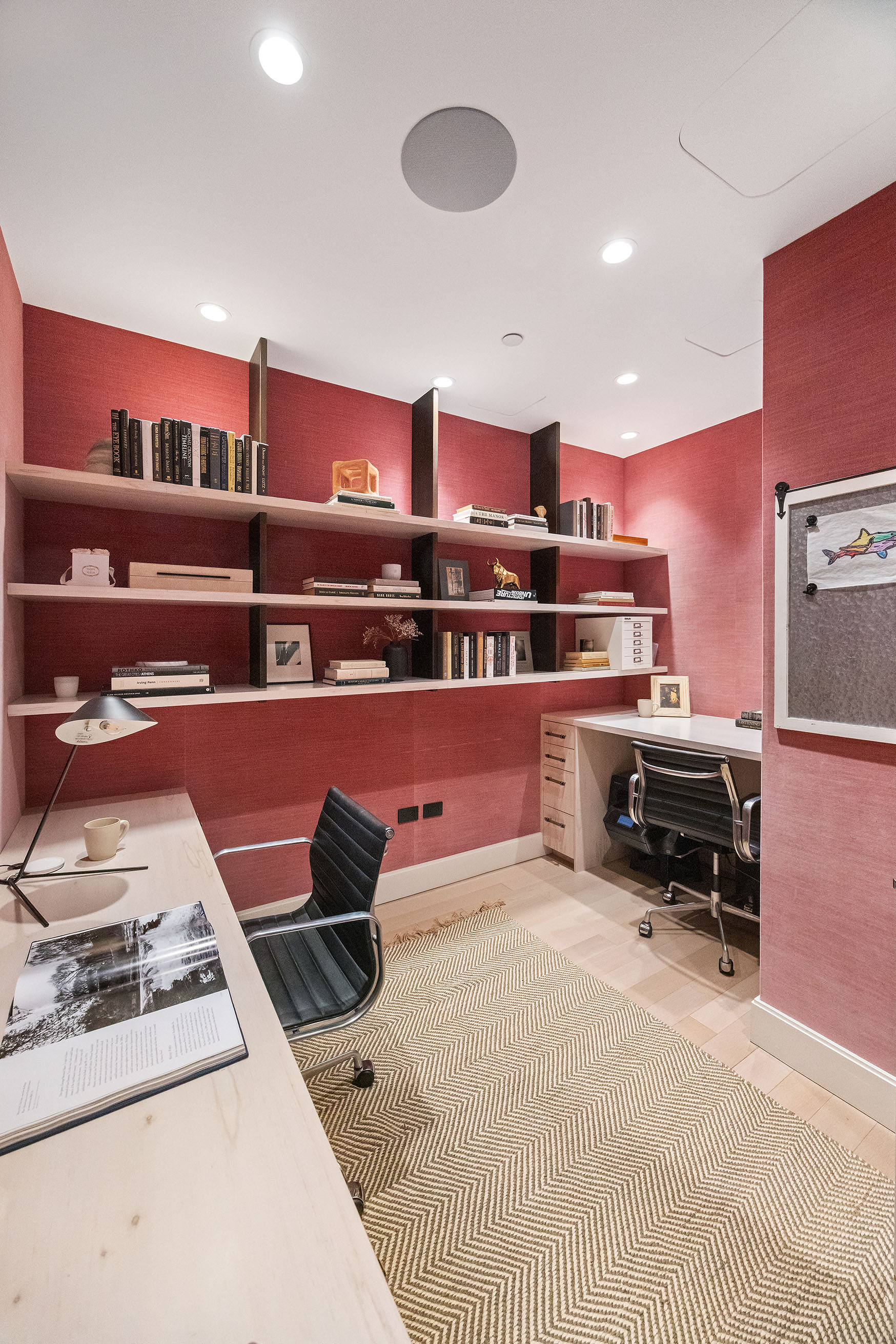 100 Barclay Street, Unit 21AD Manhattan, NY 10007 - Photo 21 of 37 a room with furniture and a book shelf