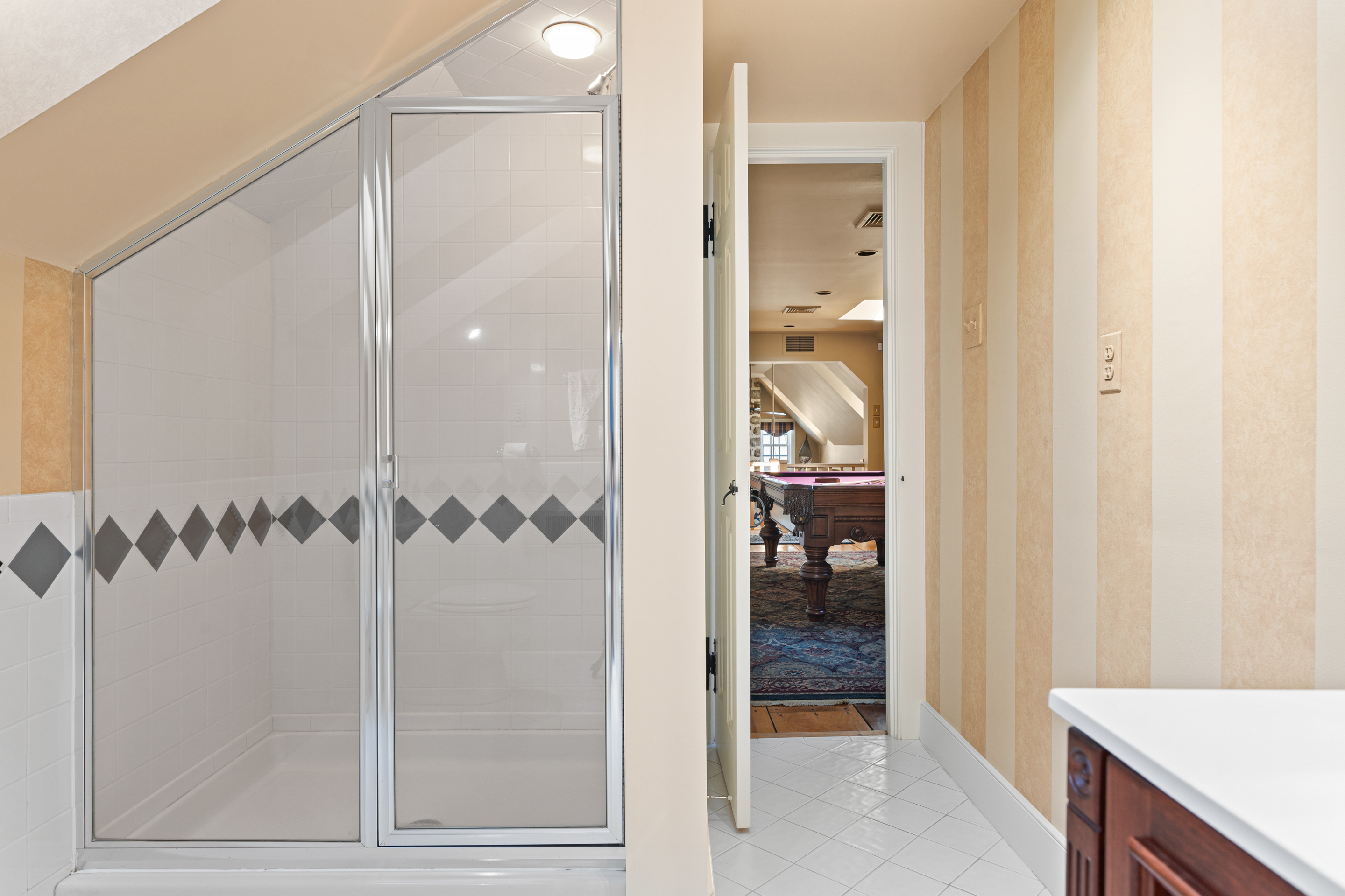791 Grubbs Mill Road Berwyn, PA 19312 - Photo 49 of 76 a bathroom with a glass shower door and a sink