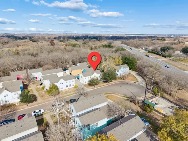 a view of a house with a yard and deck