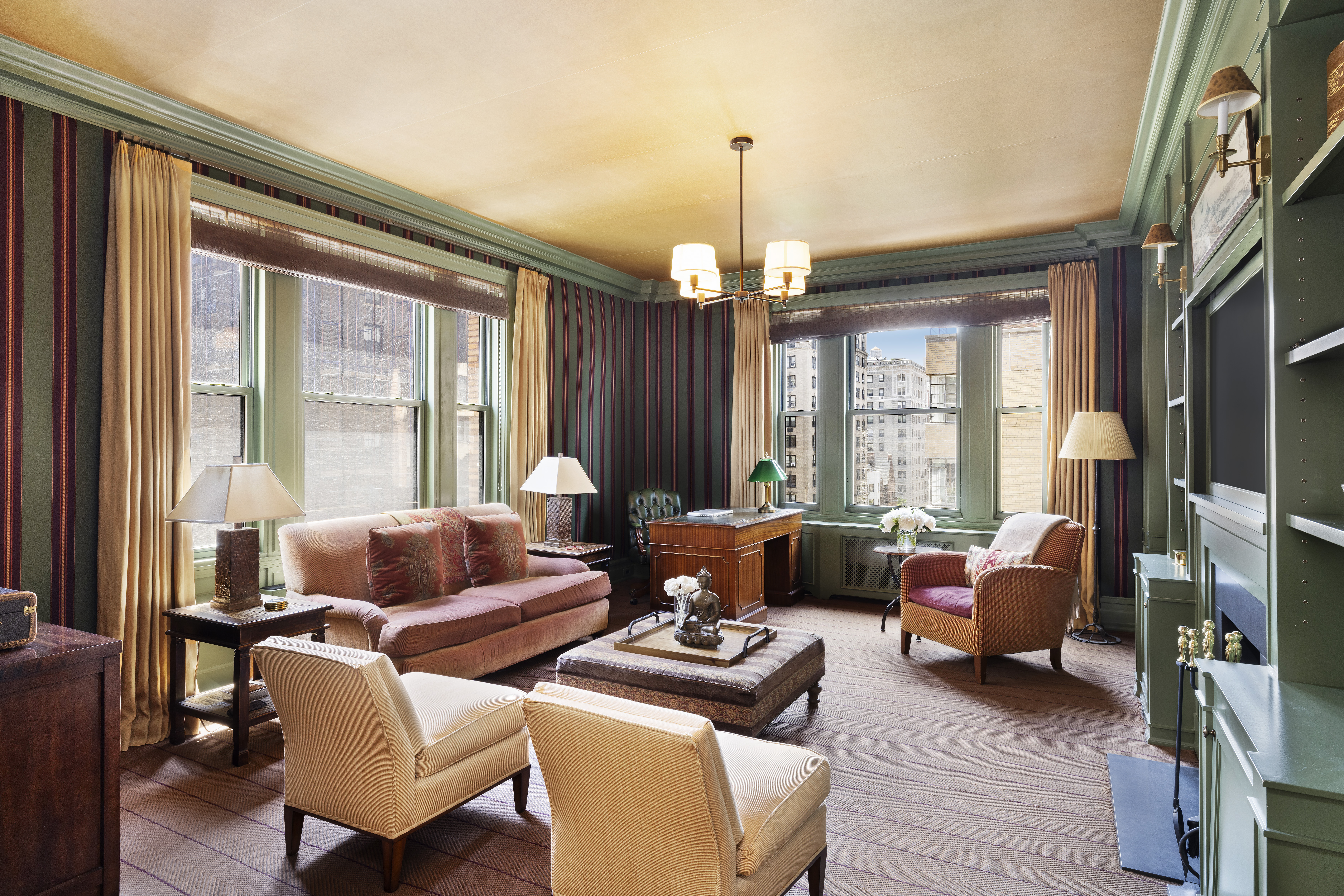 325 West End Avenue, Unit 6AB Manhattan, NY 10023 - Photo 4 of 22 a living room with furniture and a chandelier