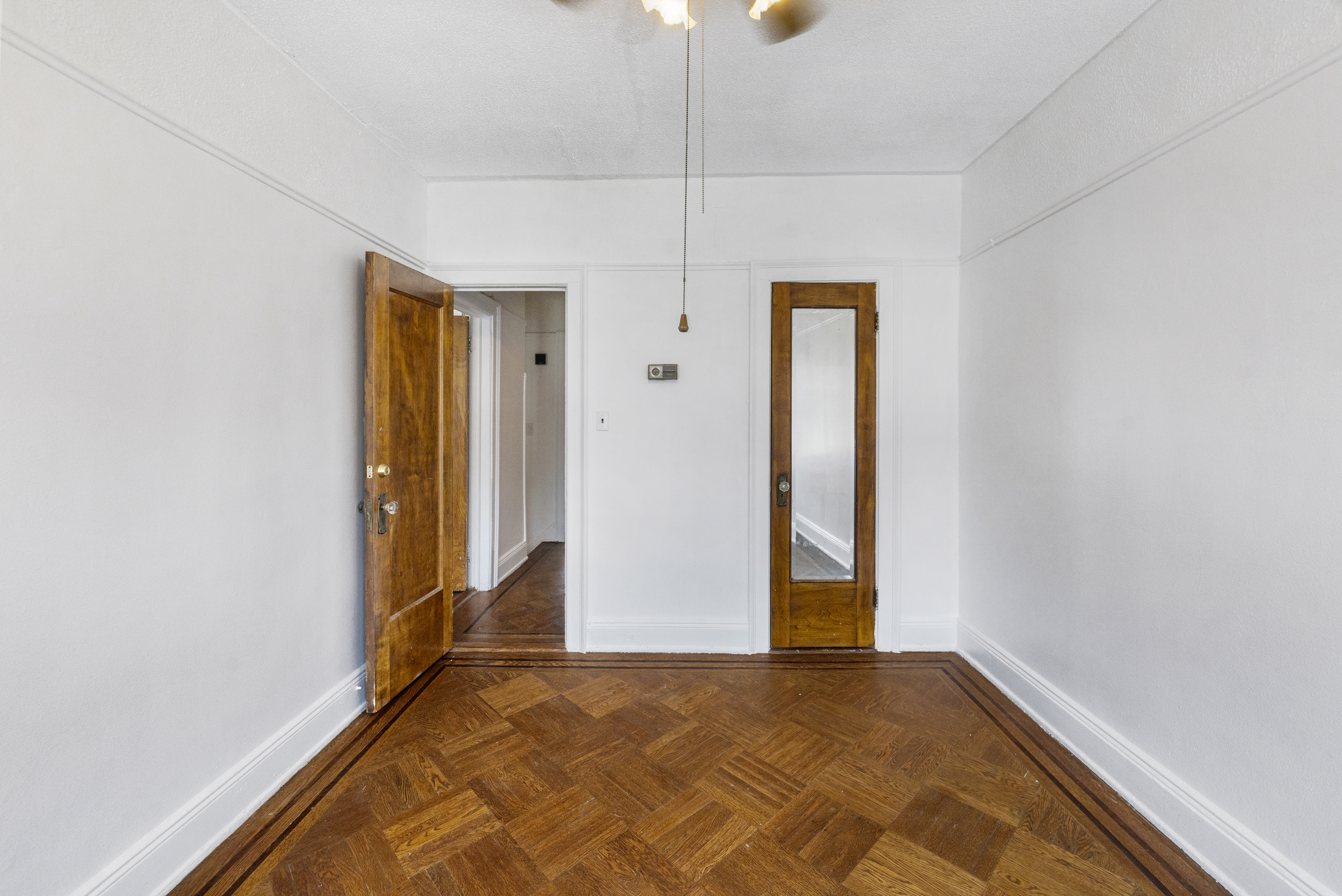 57 Hendrix Street, Unit 1 Brooklyn, NY 11207 - Photo 11 of 12 a view of an empty room with closet and a window