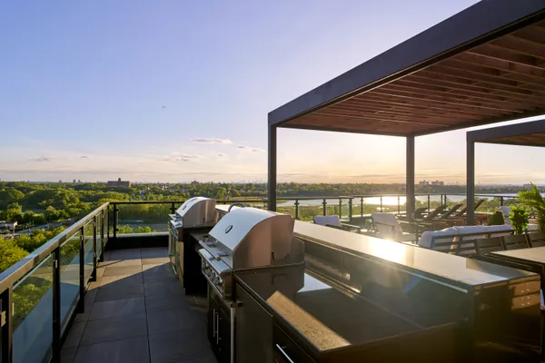 a view of roof deck with furniture
