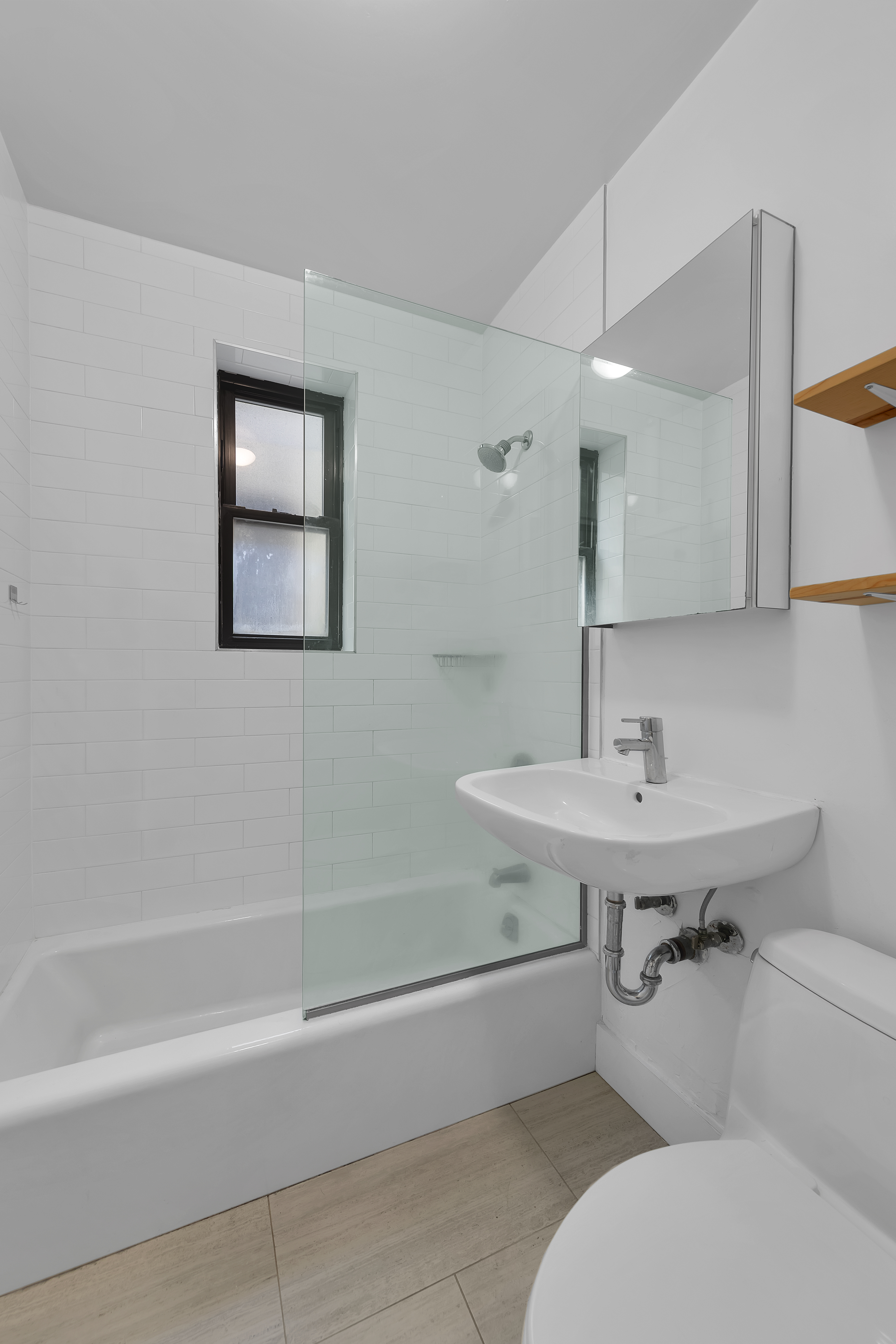 370 Columbus Avenue, Unit 5D Manhattan, NY 10024 - Photo 5 of 10 a bathroom with a sink toilet and bathtub