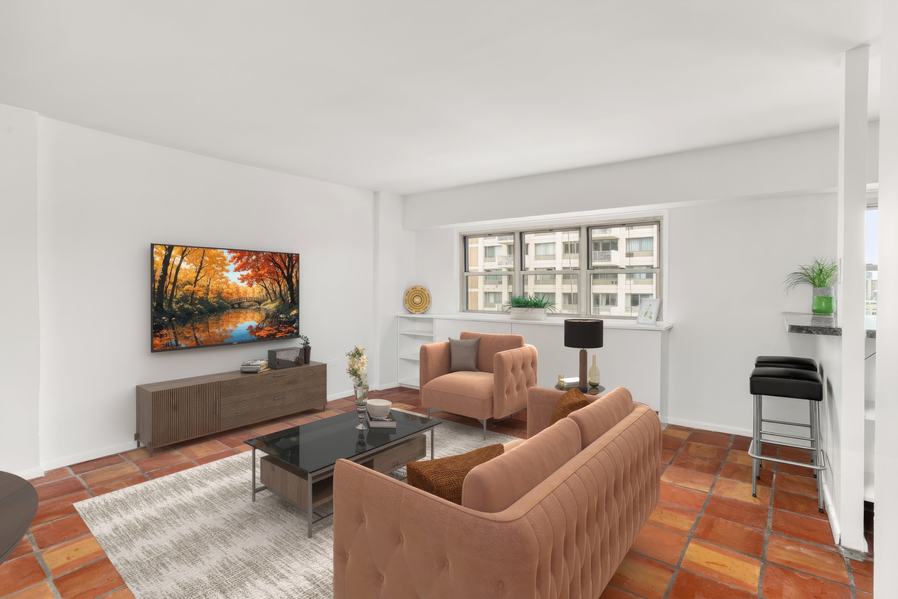 609 Columbus Avenue, Unit 14E Manhattan, NY 10024 - Photo 13 of 24 a living room with furniture and a flat screen tv