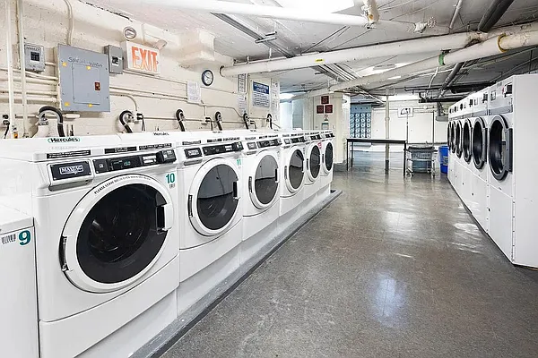 7101 Colonial Road, Unit R3E Brooklyn, NY 11209 - Photo 14 of 19 a utility room with dryer and washer