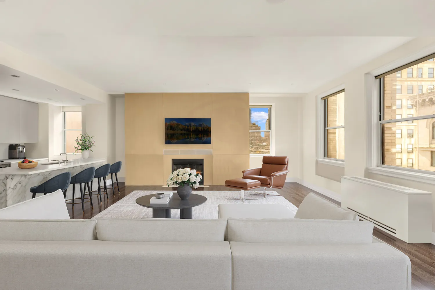 a living room with fireplace furniture and a flat screen tv