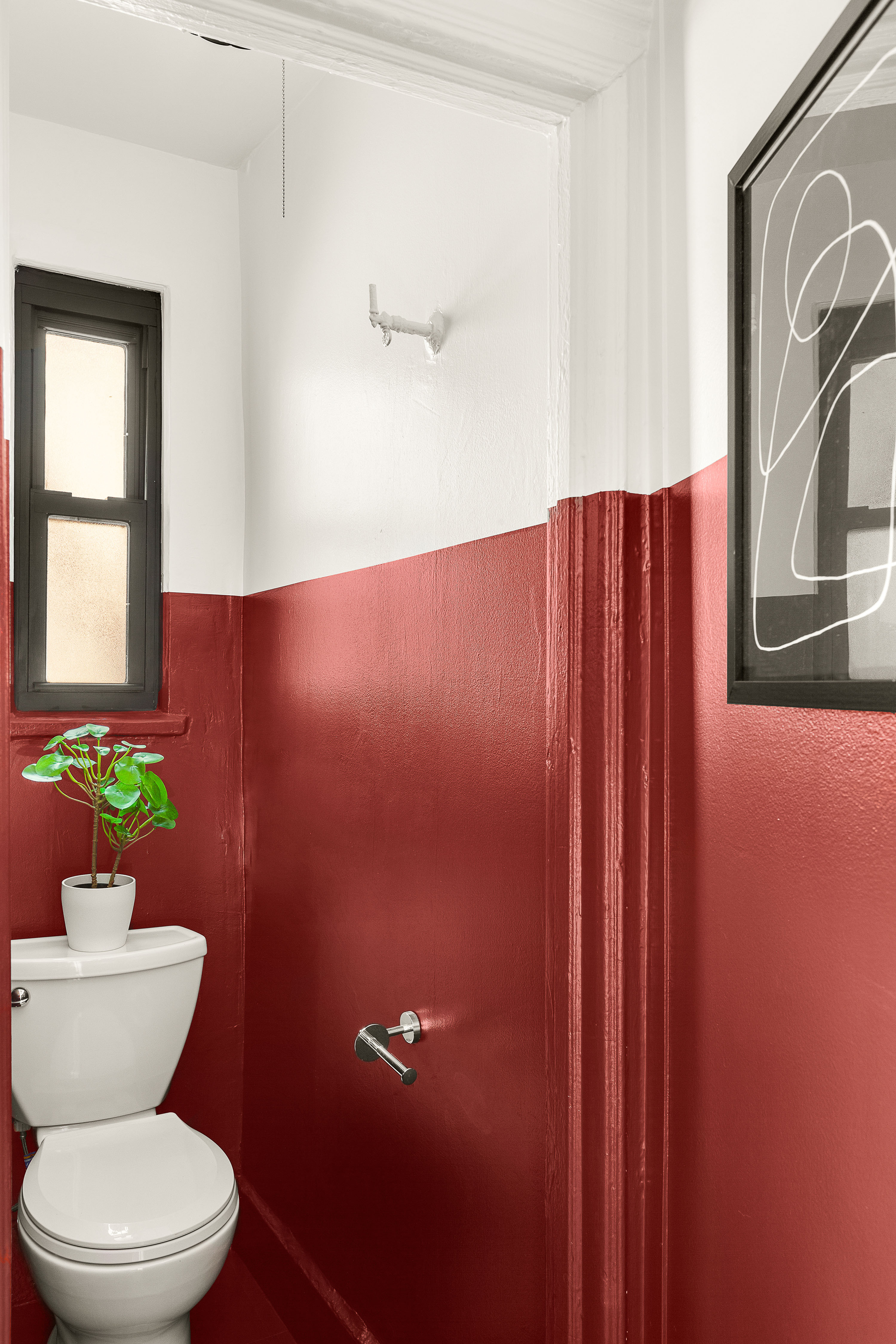 24 Cornelia Street, Unit 15 Manhattan, NY 10014 - Photo 8 of 13 a bathroom with a toilet a sink and mirror