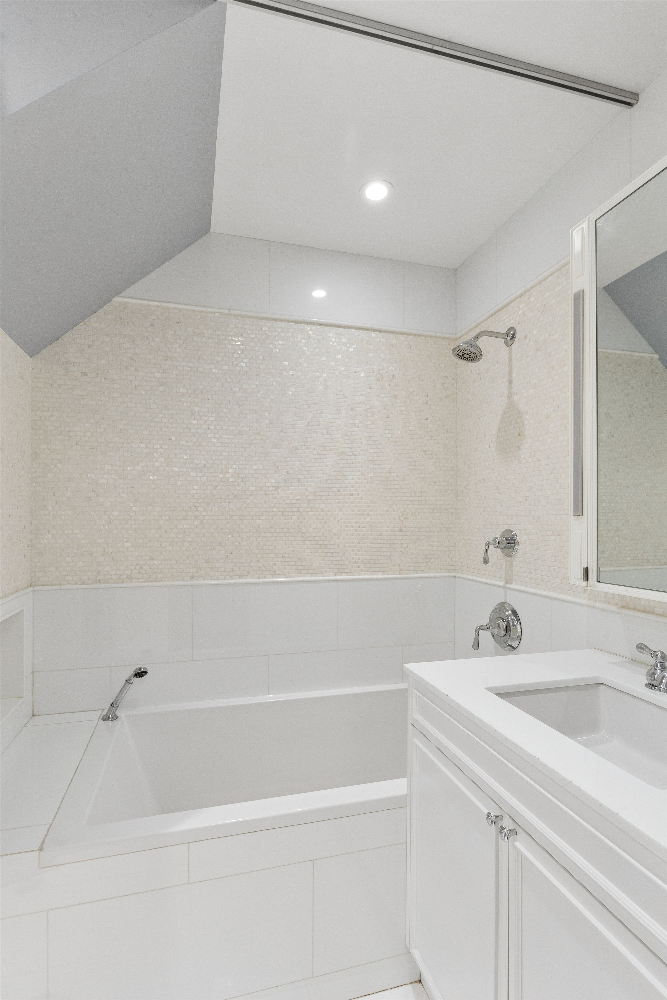 165 West 126th Street Manhattan, NY 10027 - Photo 20 of 40 a bathroom with a sink and a shower