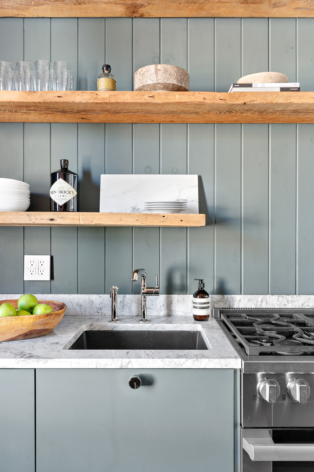 110 Thompson Street, Unit 6E Manhattan, NY 10012 - Photo 3 of 8 a kitchen with a sink a stove and cabinets