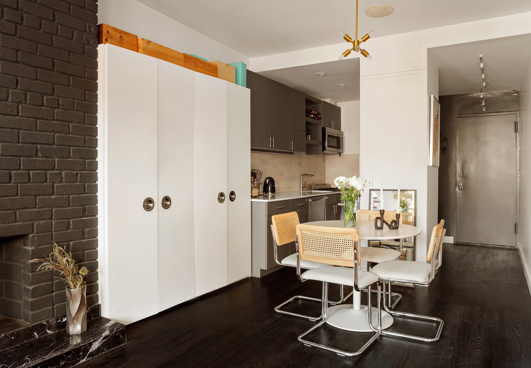 250 West 15th Street, Unit PH6E Manhattan, NY 10011 - Photo 5 of 9 a room with furniture and wooden floor