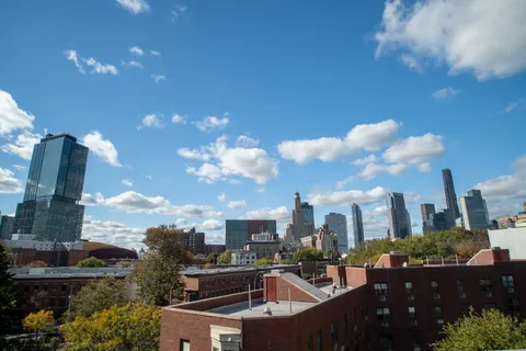 a city view with tall buildings