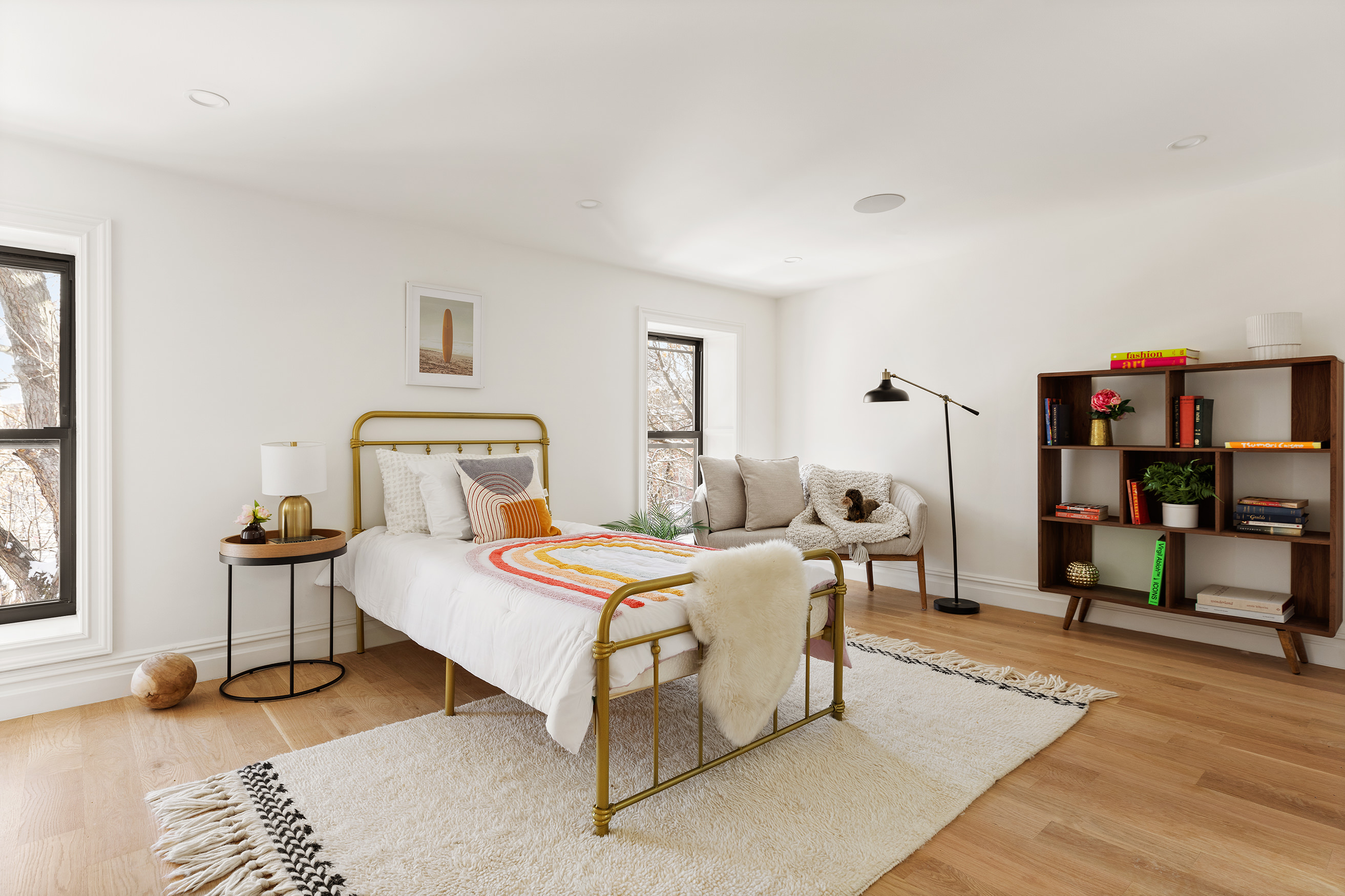 15 Verona Place Brooklyn, NY 11216 - Photo 9 of 14 a bedroom with a bed and a table in it