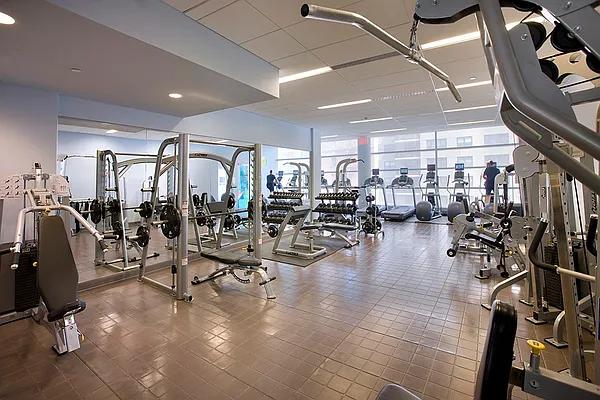 200 West 67th Street, Unit 32C Manhattan, NY 10023 - Photo 13 of 17 a view of a room with gym equipment