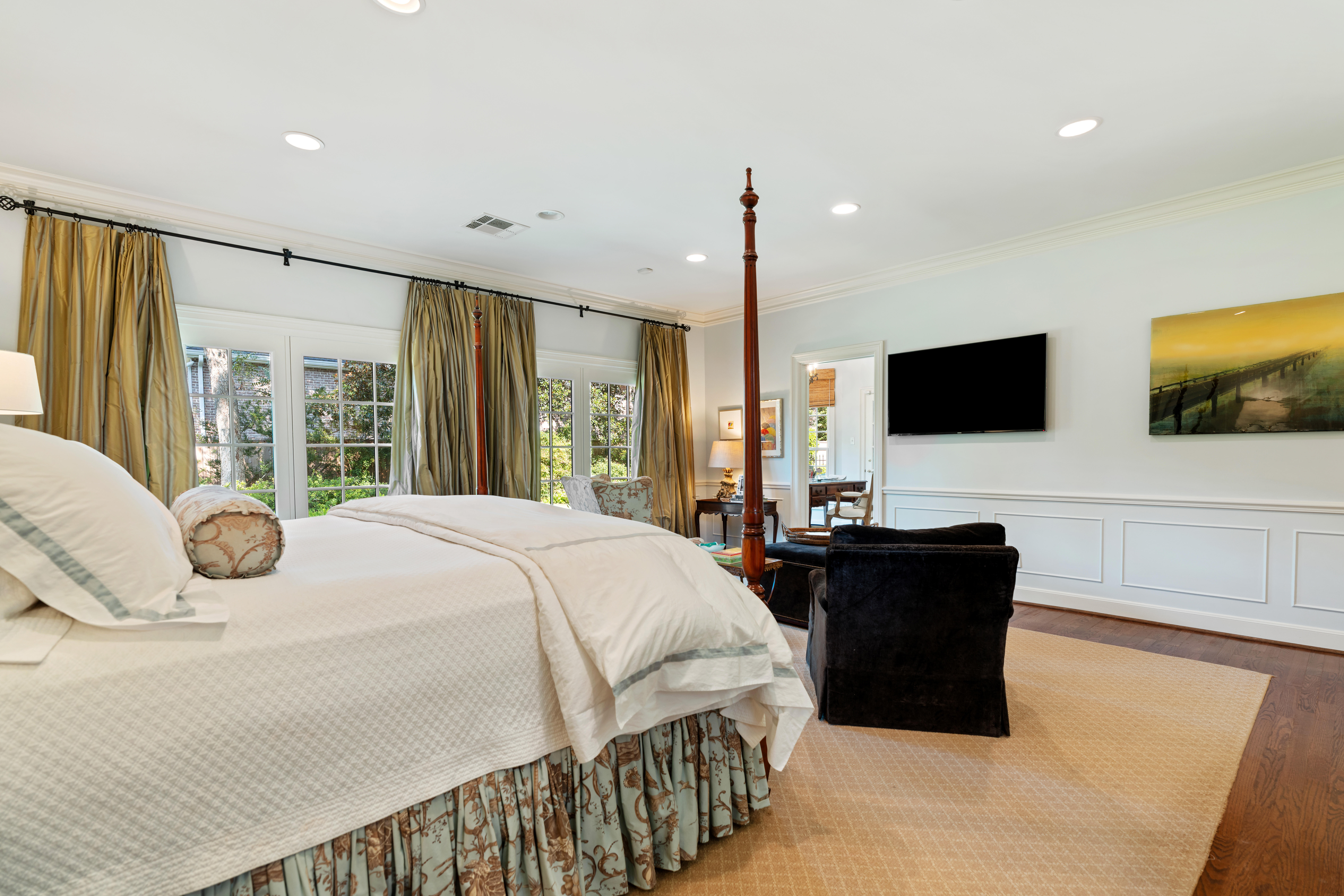 711 Pifer Road Houston, TX 77024 - Photo 24 of 53 a bedroom with a bed and a flat screen tv