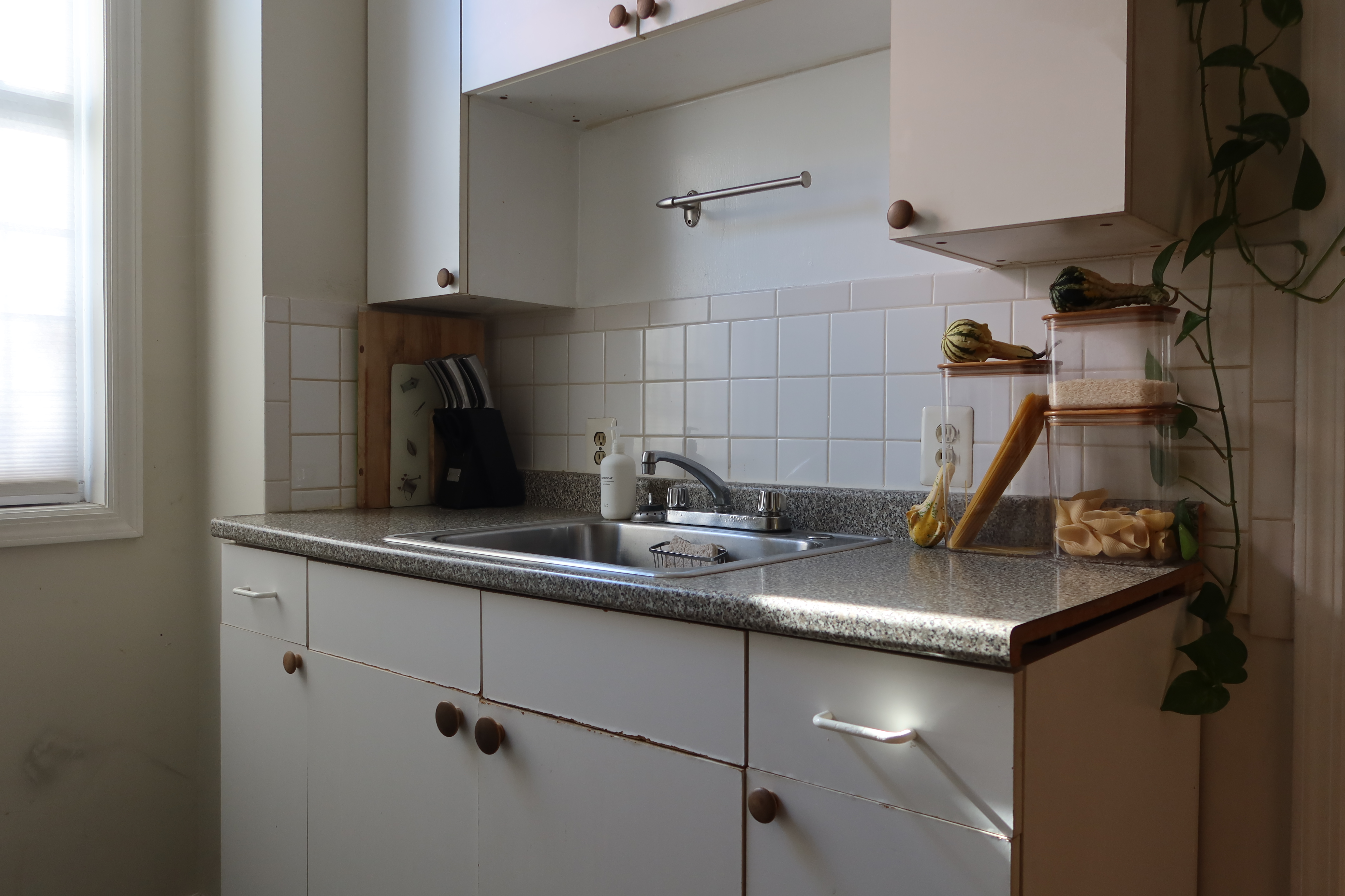 56 Stagg Street, Unit 1A Brooklyn, NY 11206 - Photo 14 of 15 a kitchen with a sink and cabinets